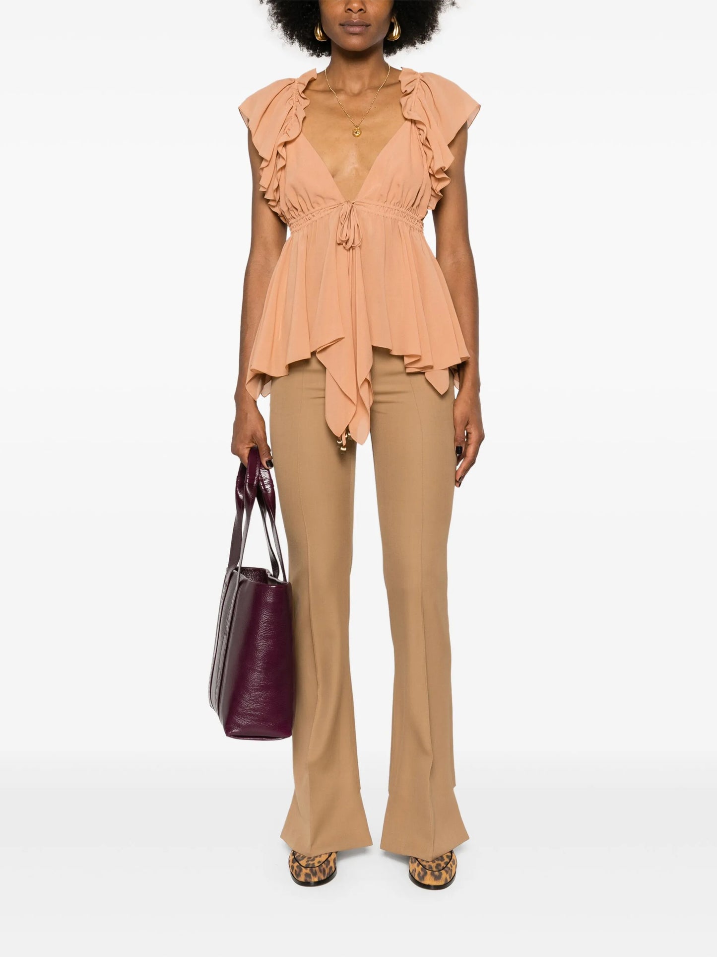 ruffled sleeveless silk blouse