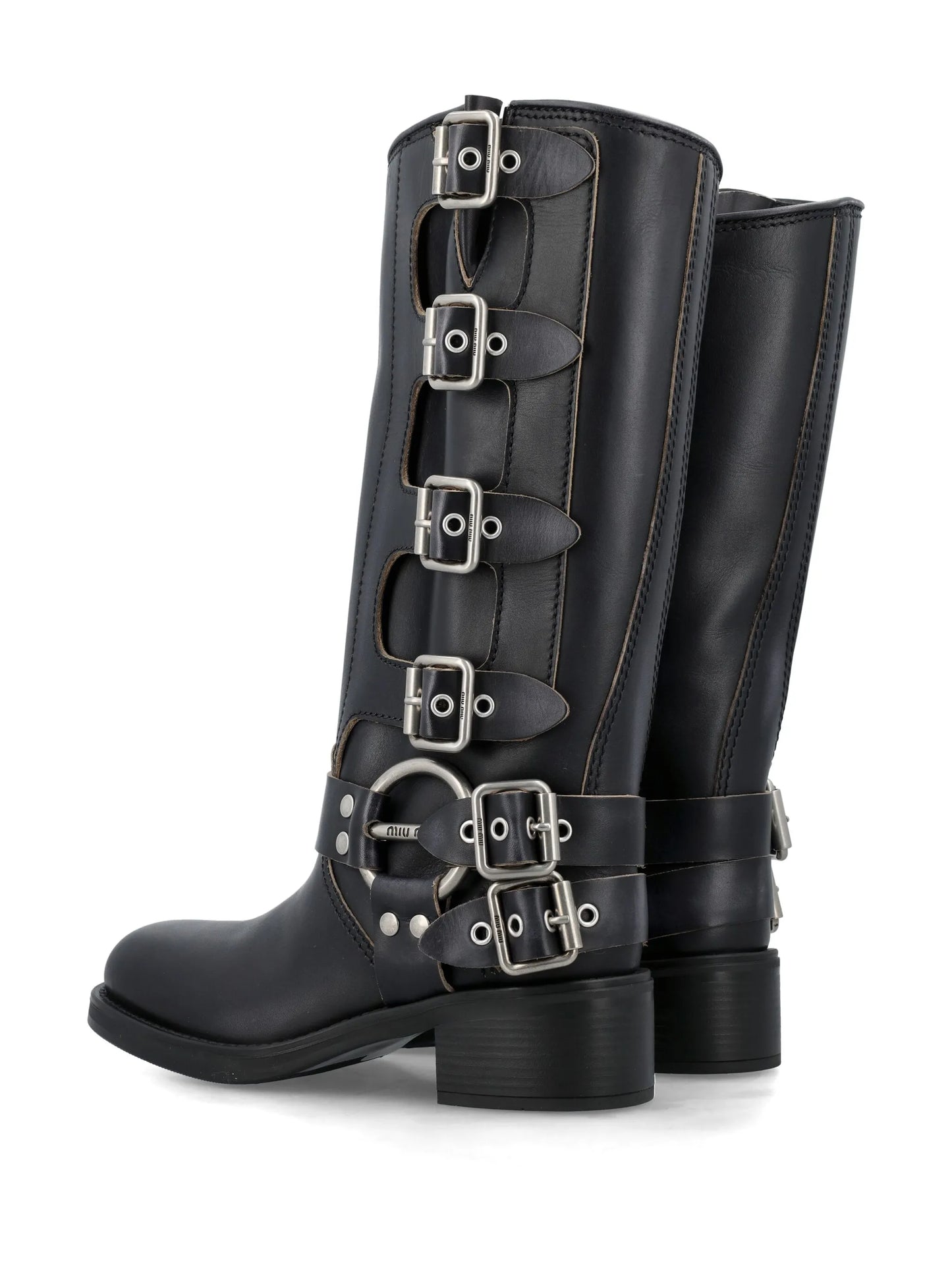 buckled knee-high leather boots