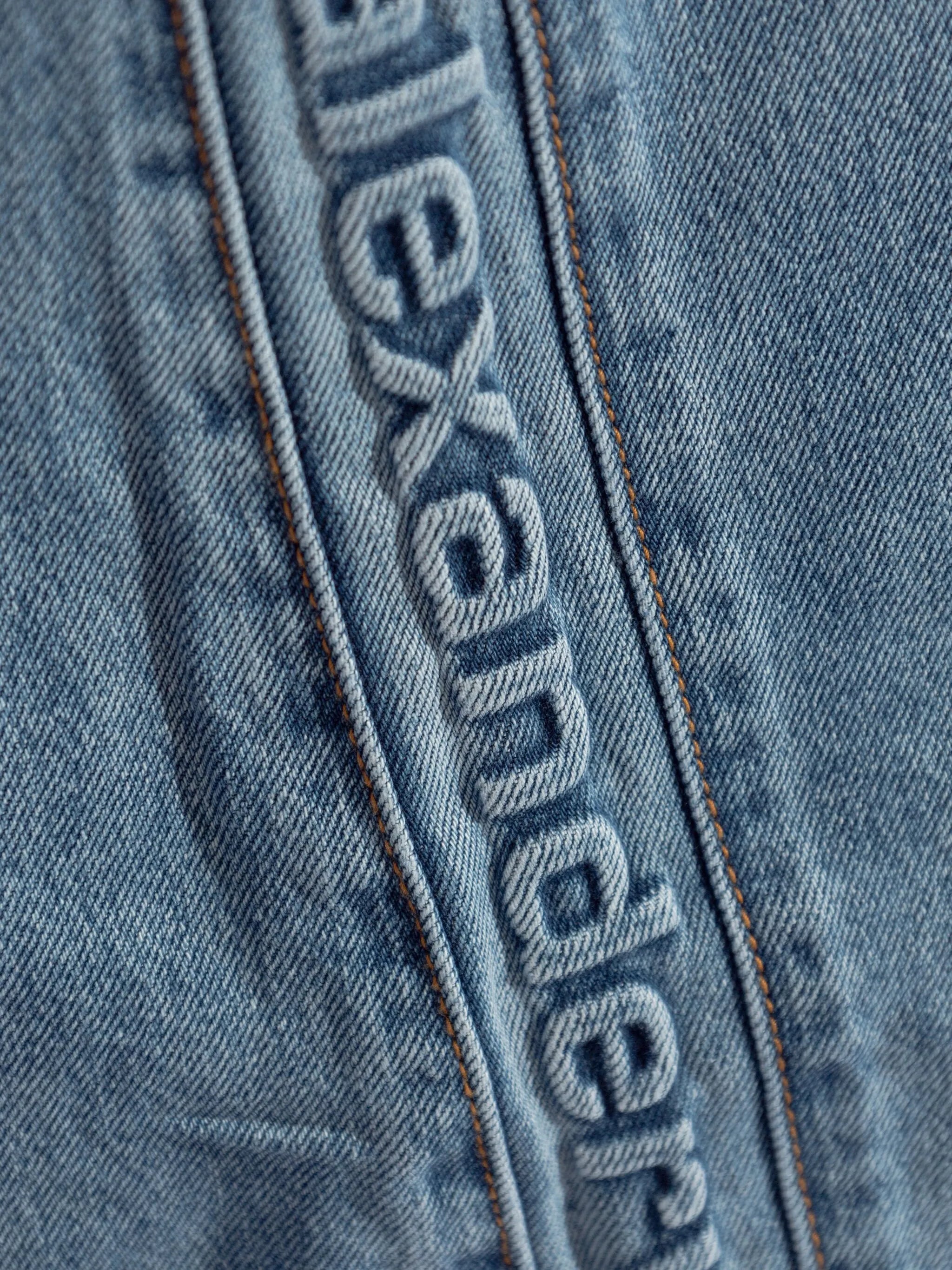logo-embossed boyfriend jeans