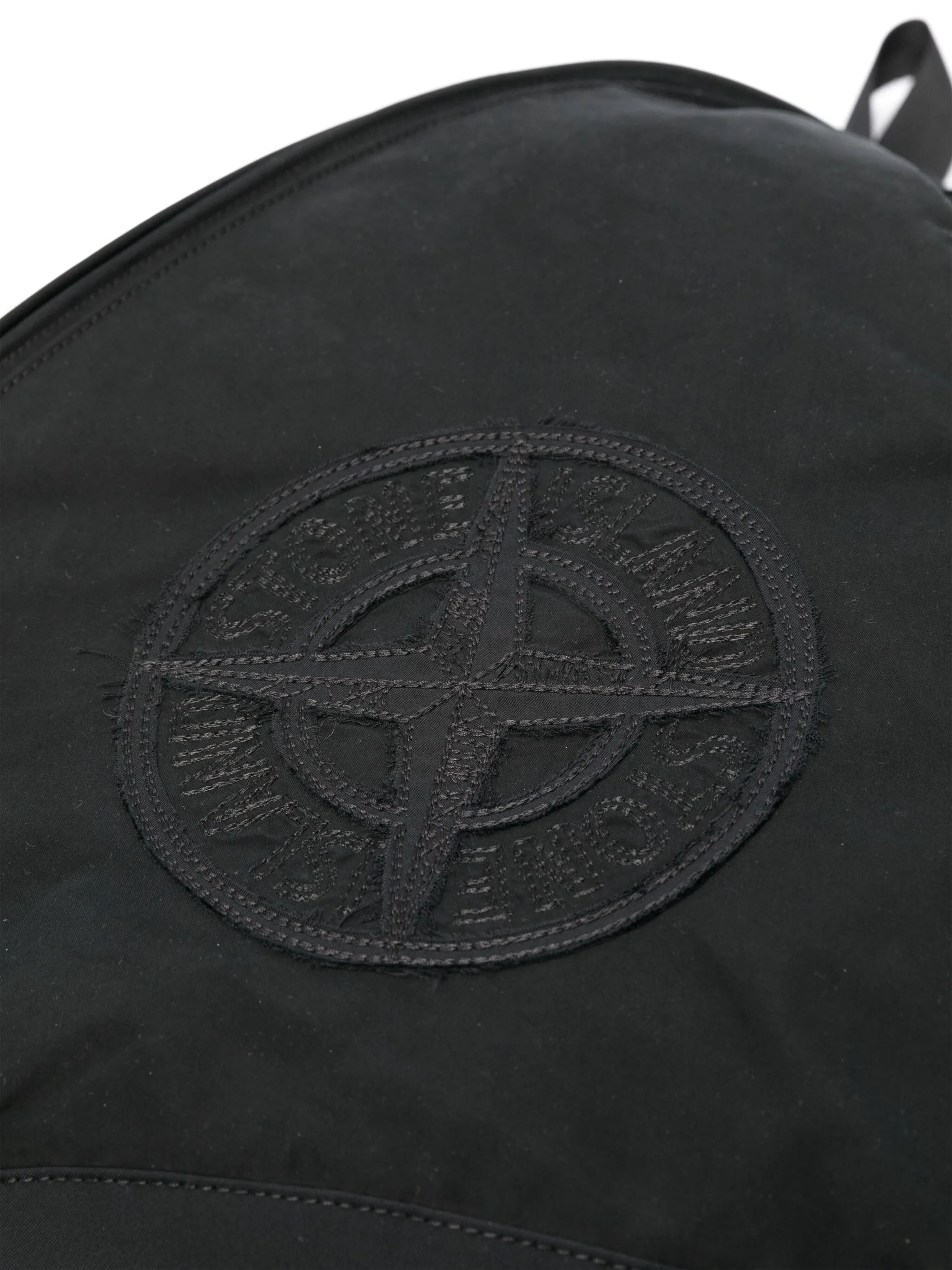 Compass-patch sling backpack