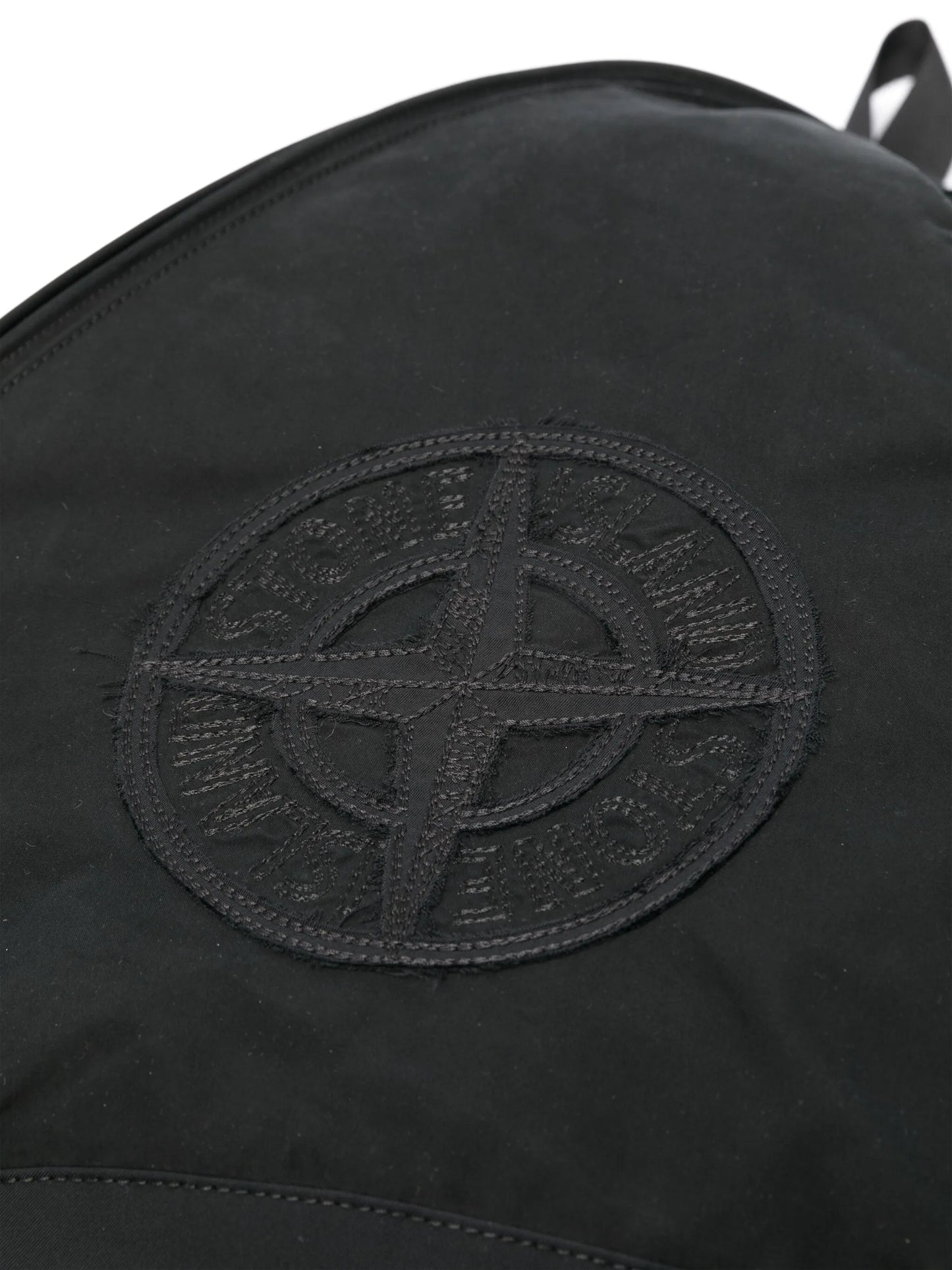 Compass-patch sling backpack