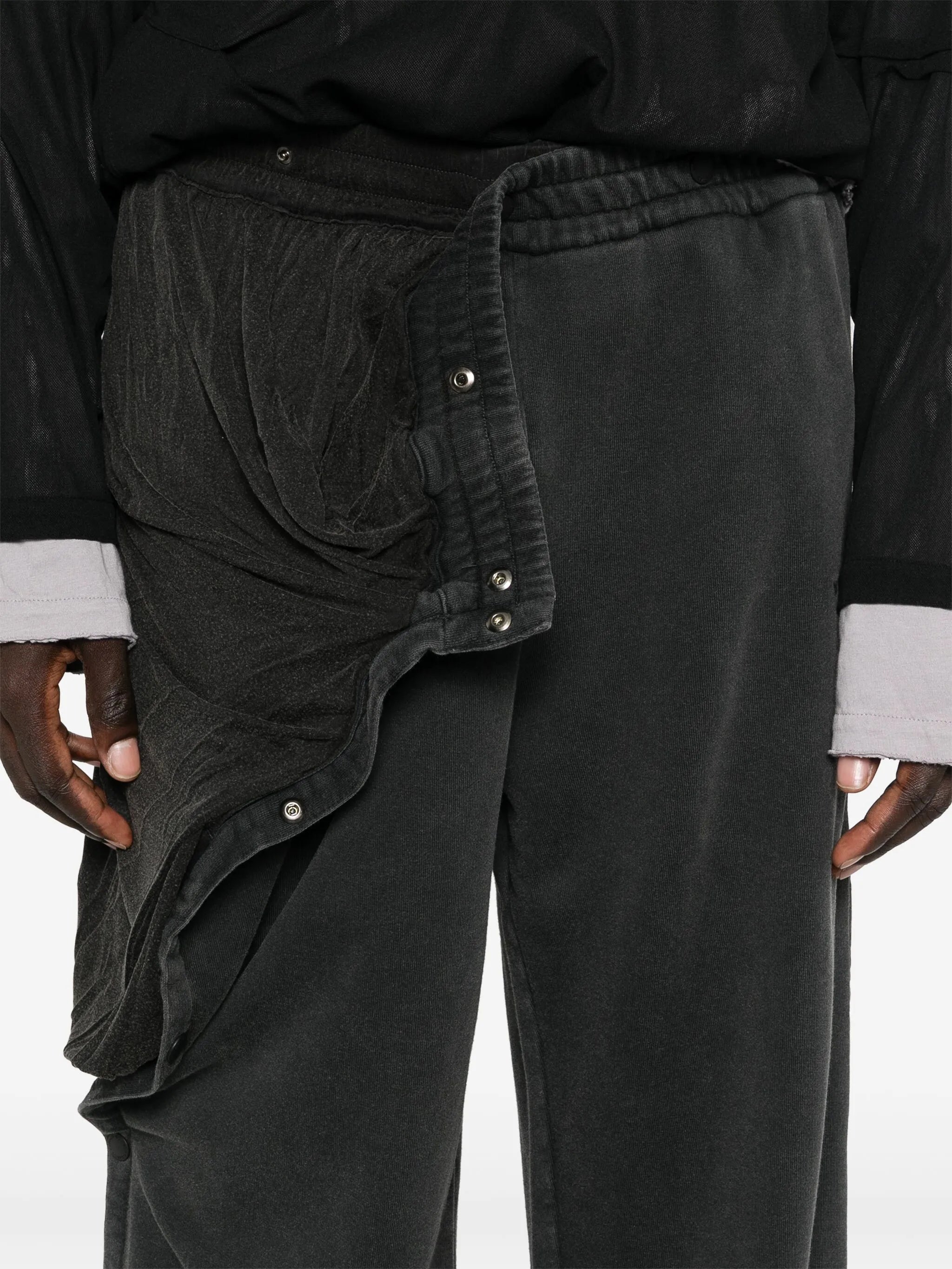 layered track pants