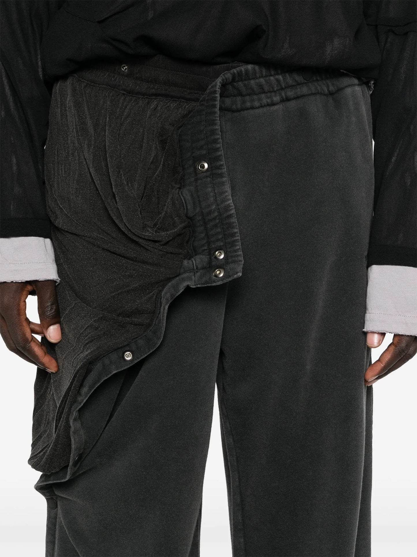 layered track pants