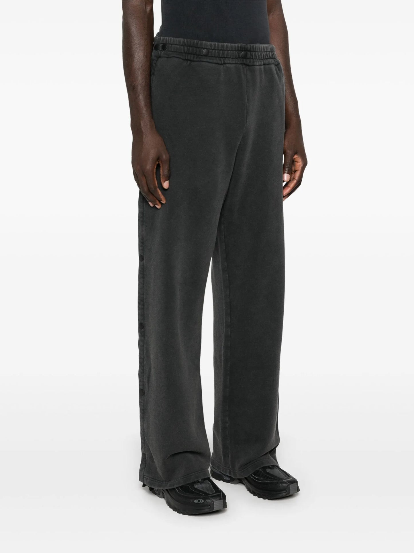 layered track pants
