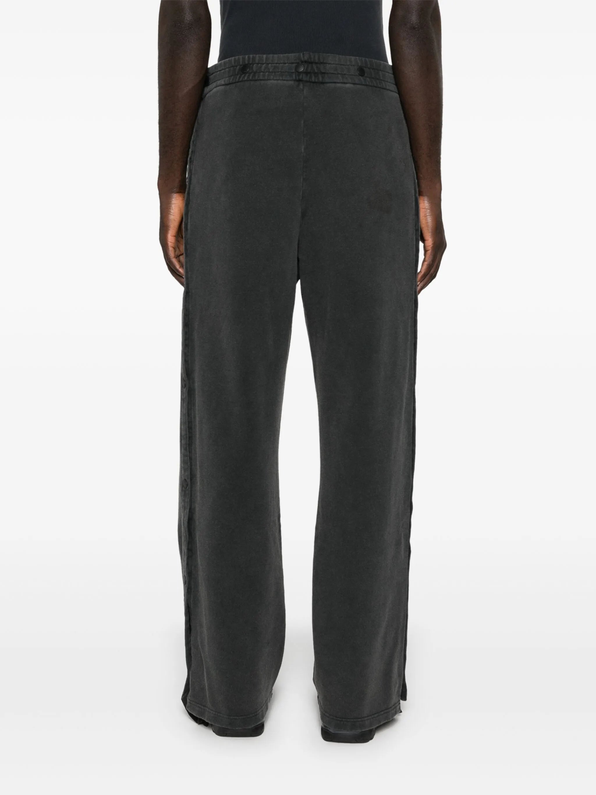 layered track pants