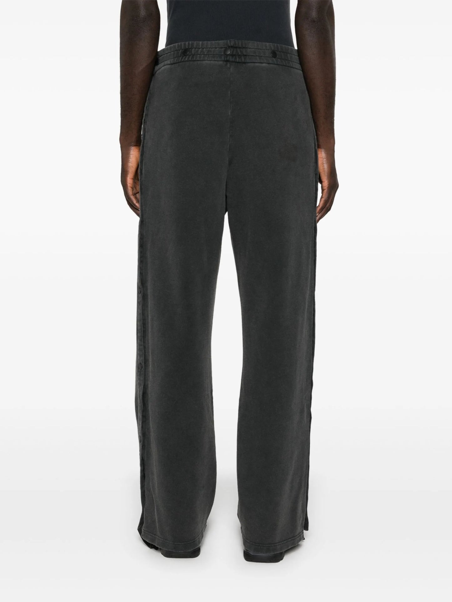 layered track pants