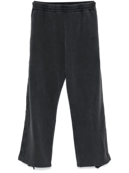 layered track pants