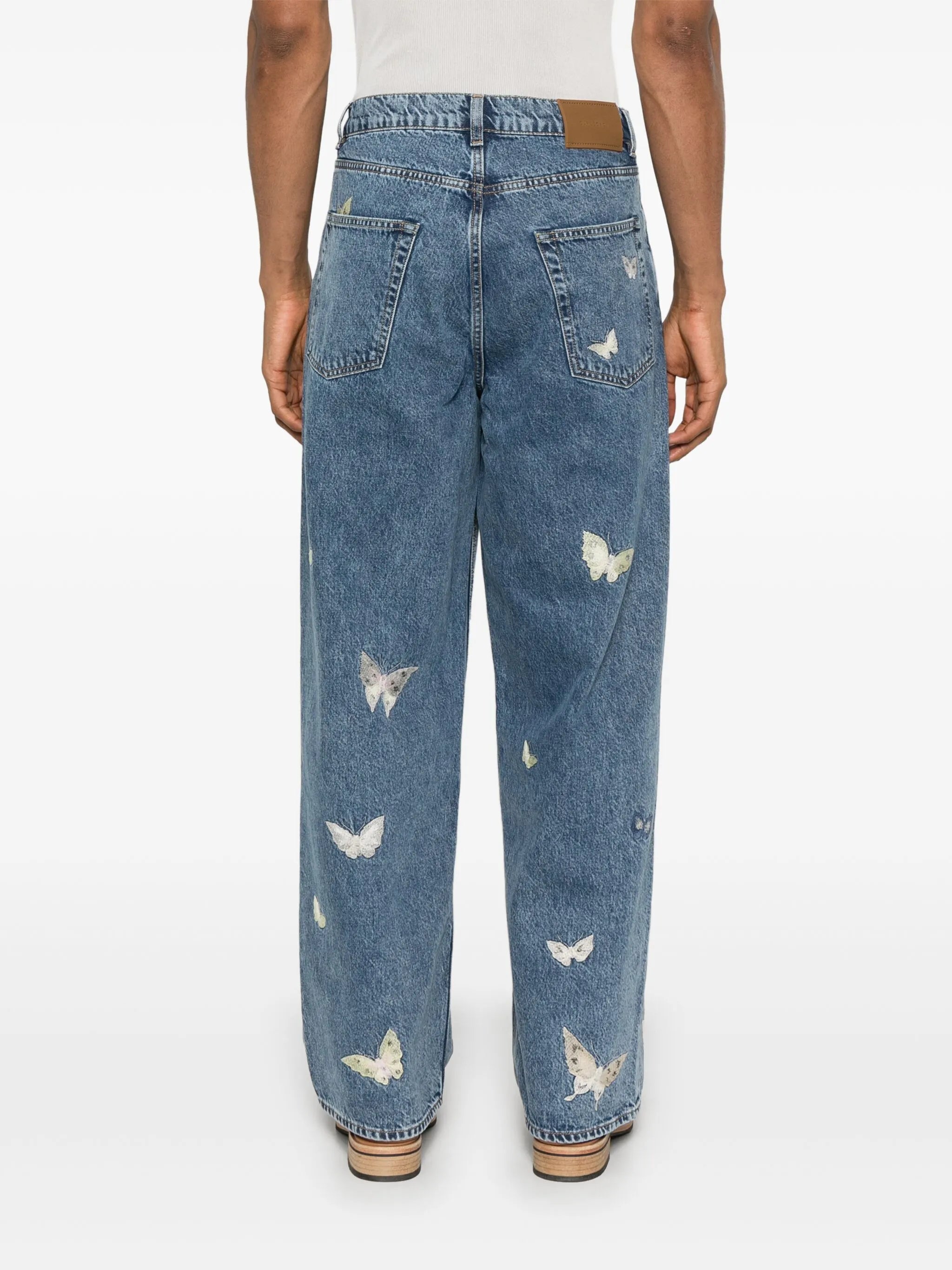 butterfly-embroidered jeans