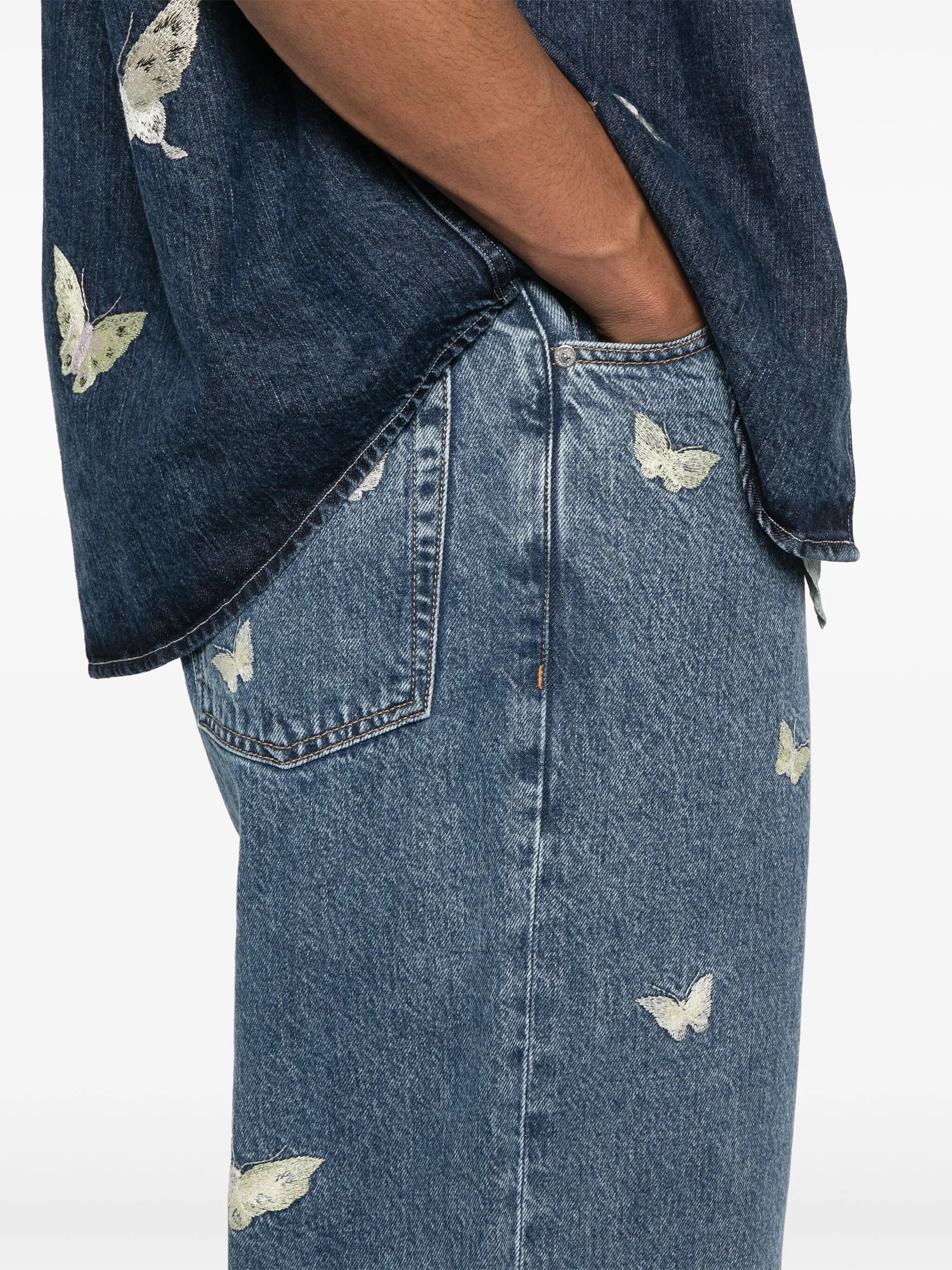 butterfly-embroidered jeans