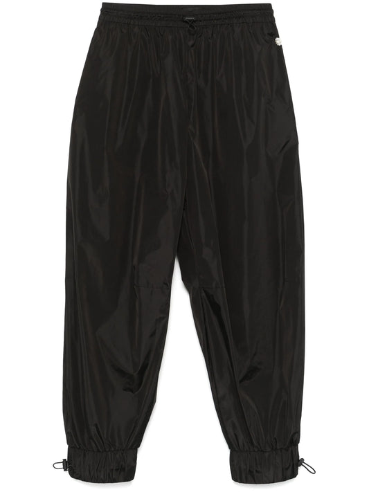 daisy-embellished track pants