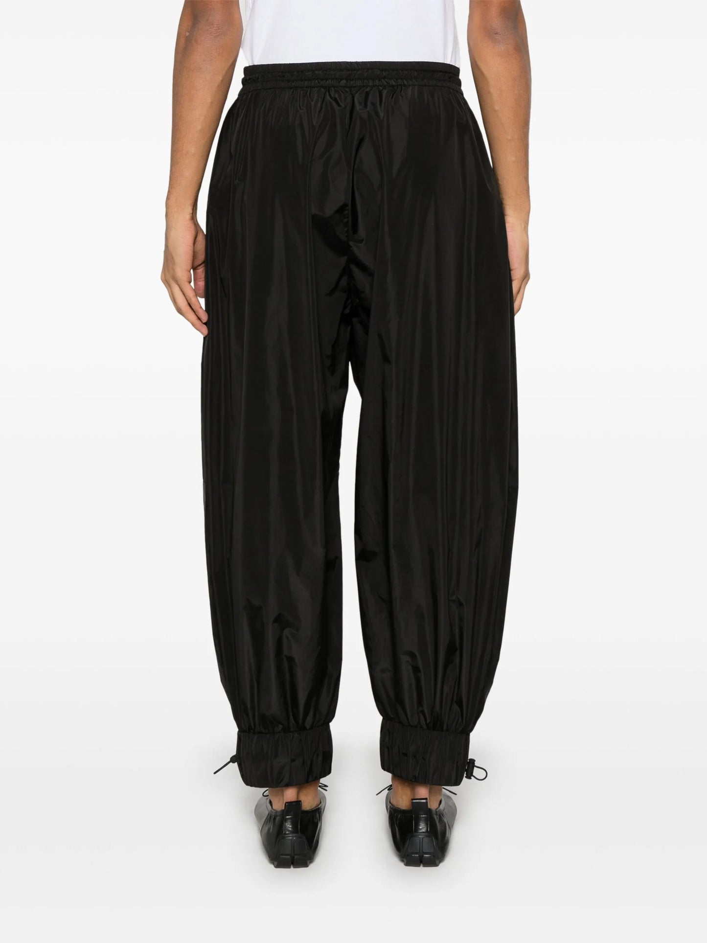 daisy-embellished track pants