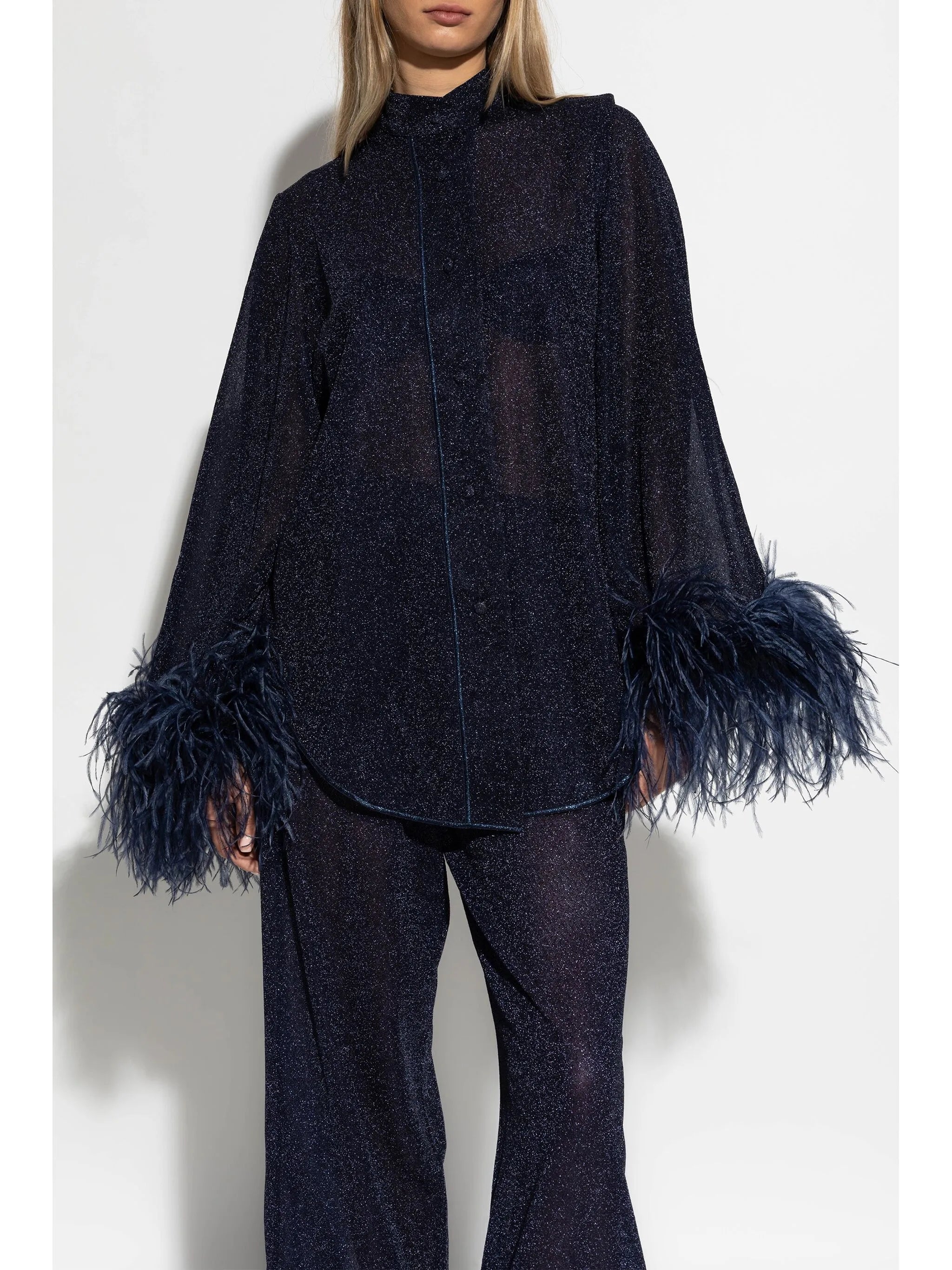 feather-embellished blouse