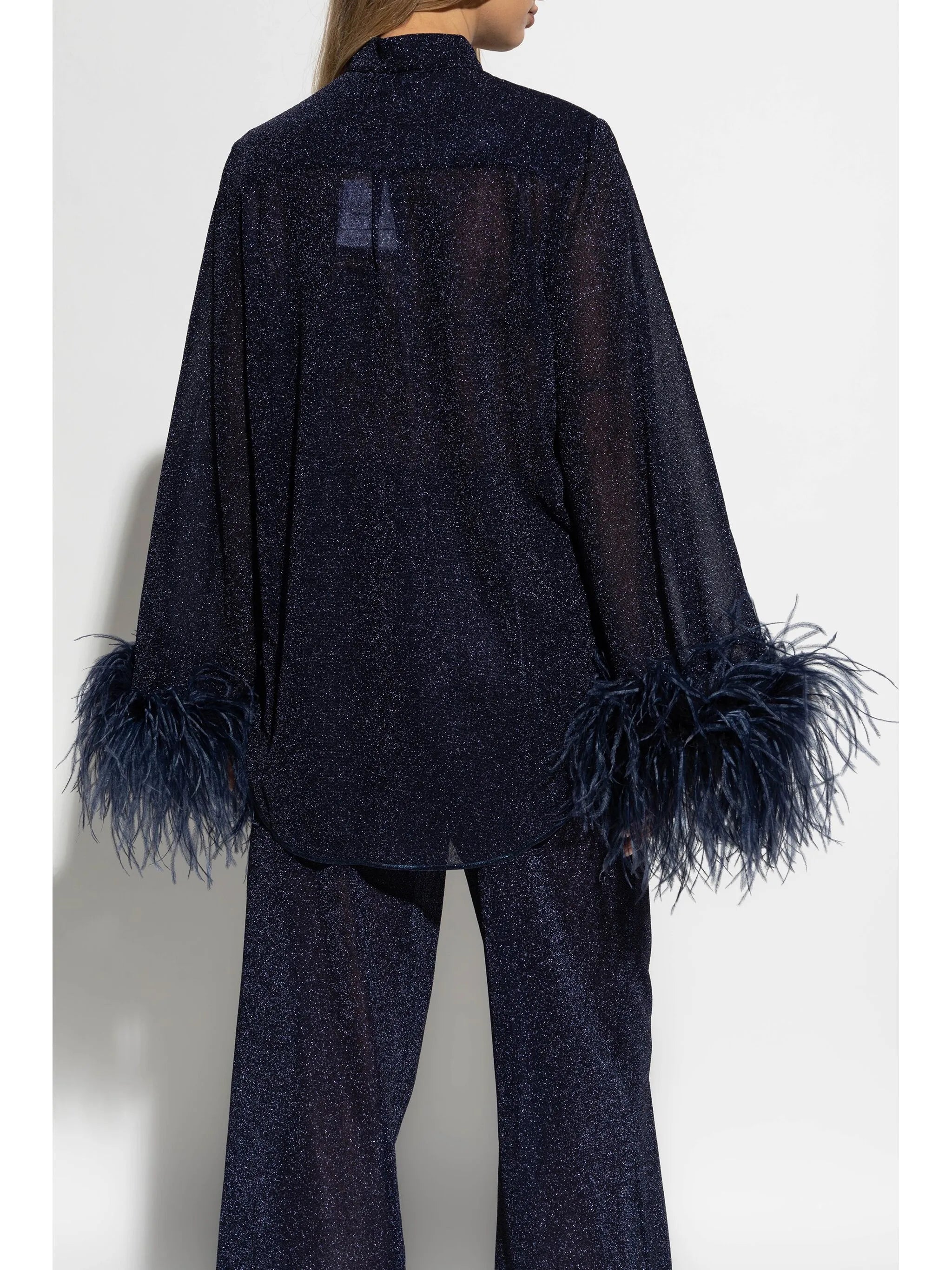feather-embellished blouse