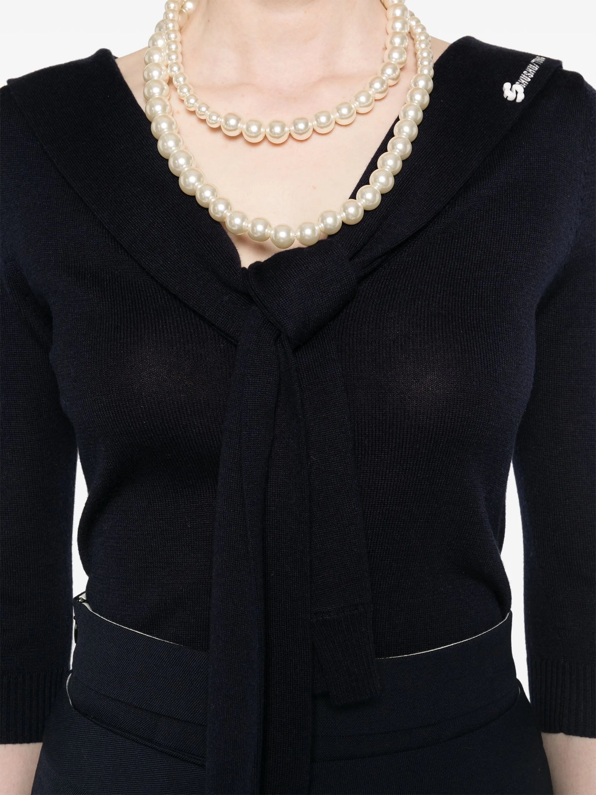 tie-fastening sweater
