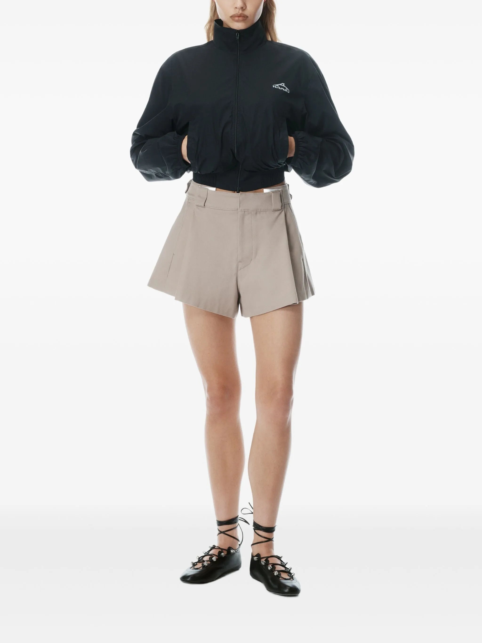 high-waisted pleated shorts