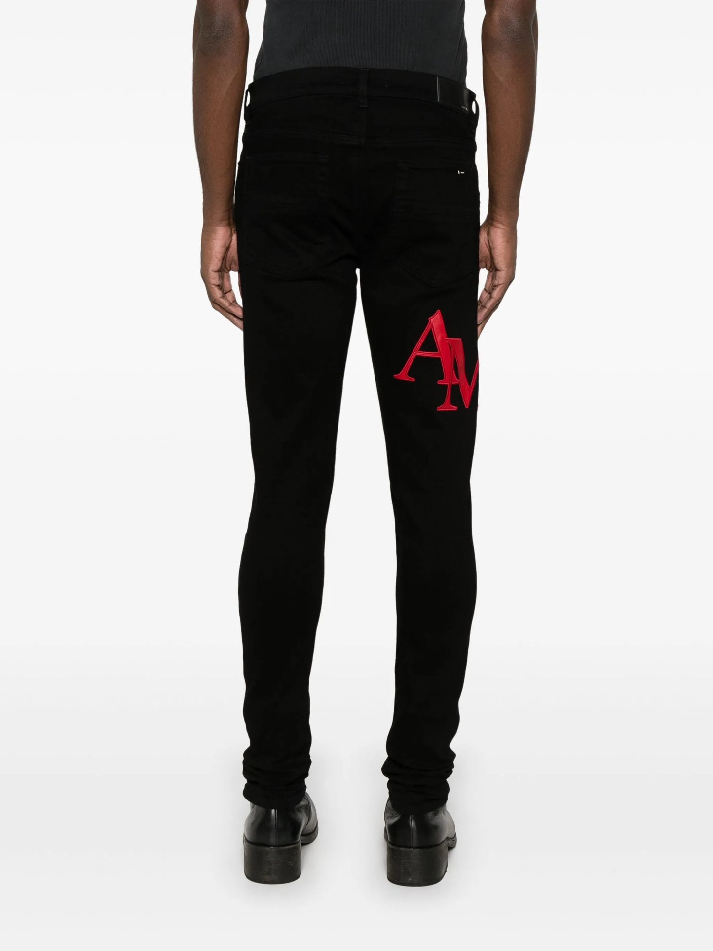 Staggered-logo-embroidered jeans