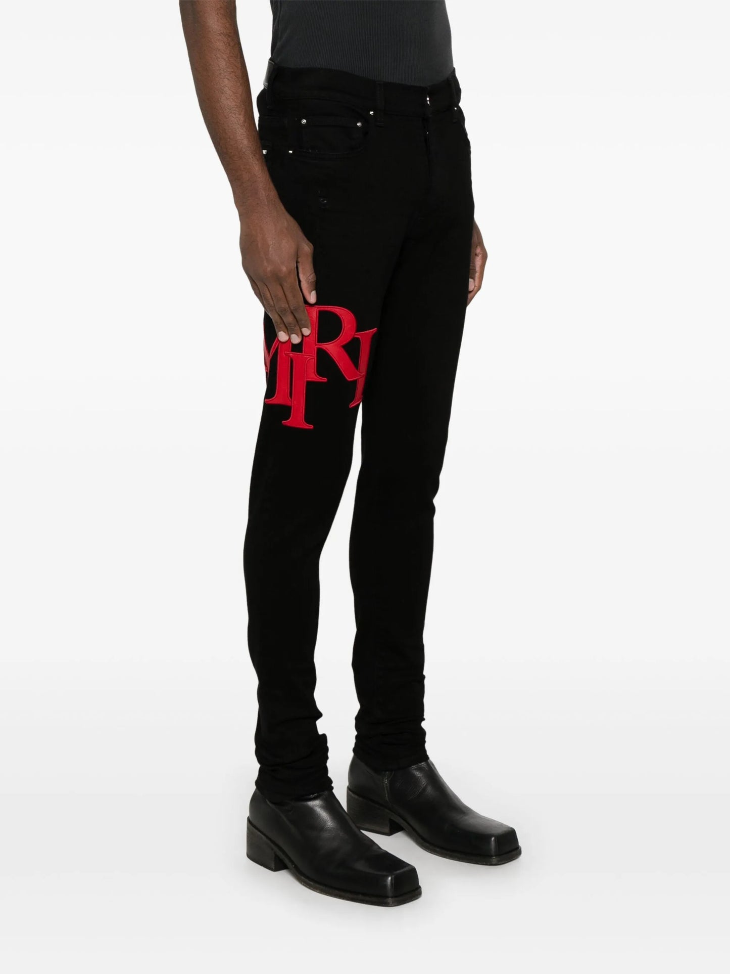 Staggered-logo-embroidered jeans