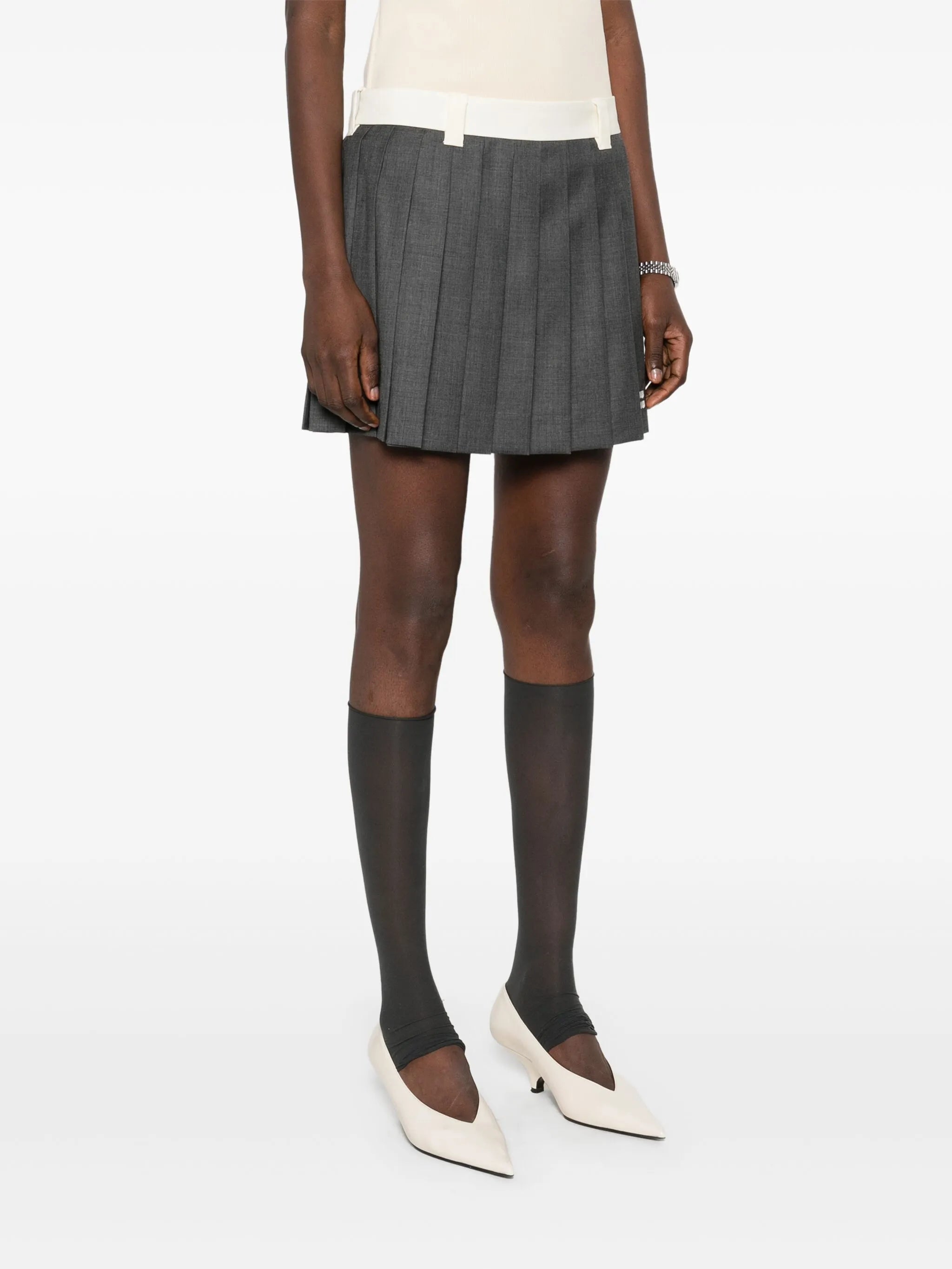 pleated mini skirt