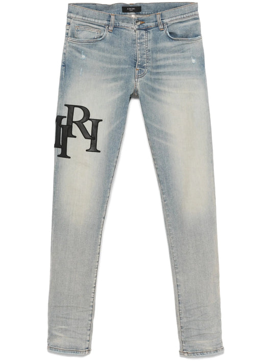 Staggered-logo jeans