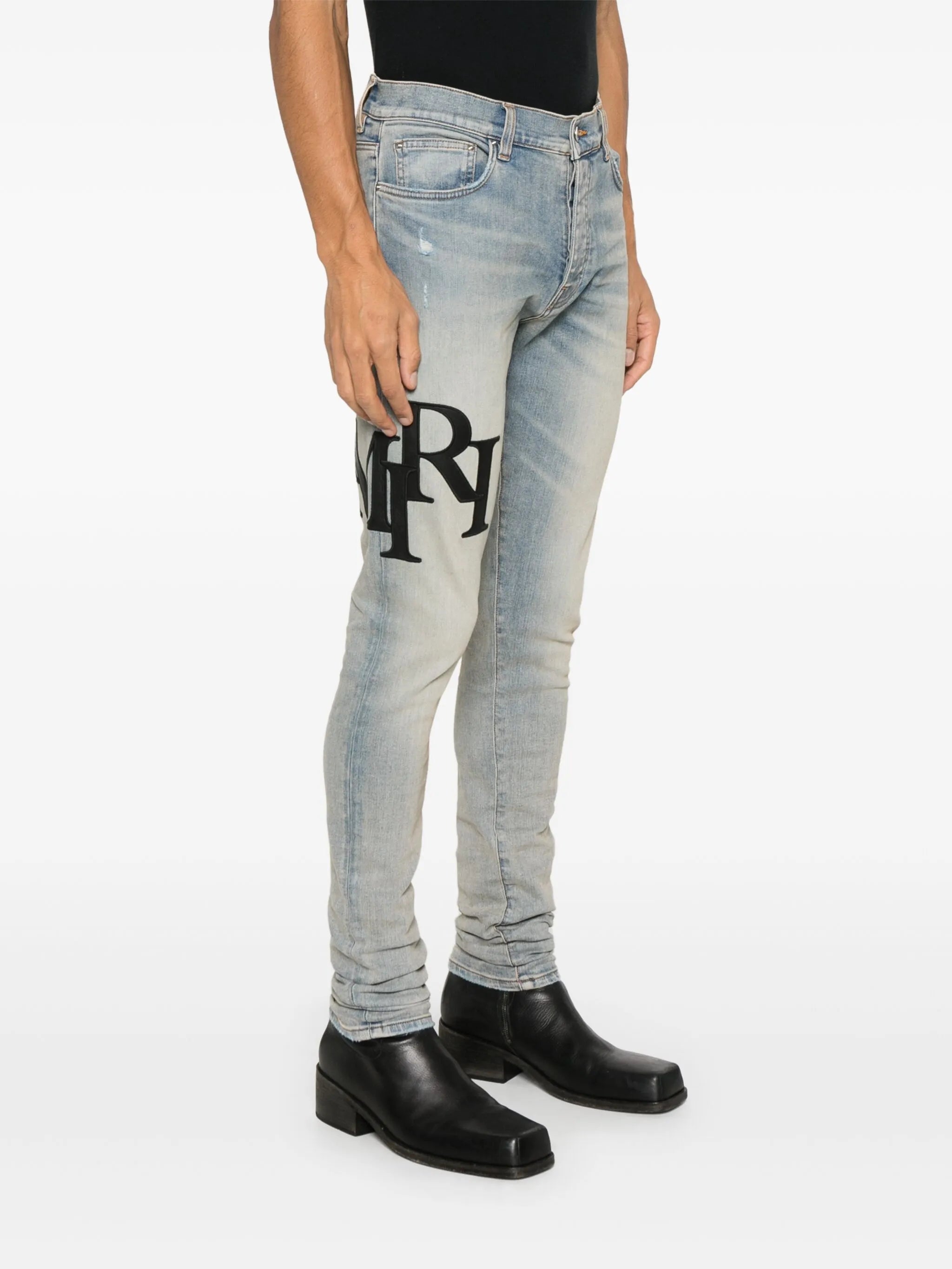 staggered logo skinny jeans - black red