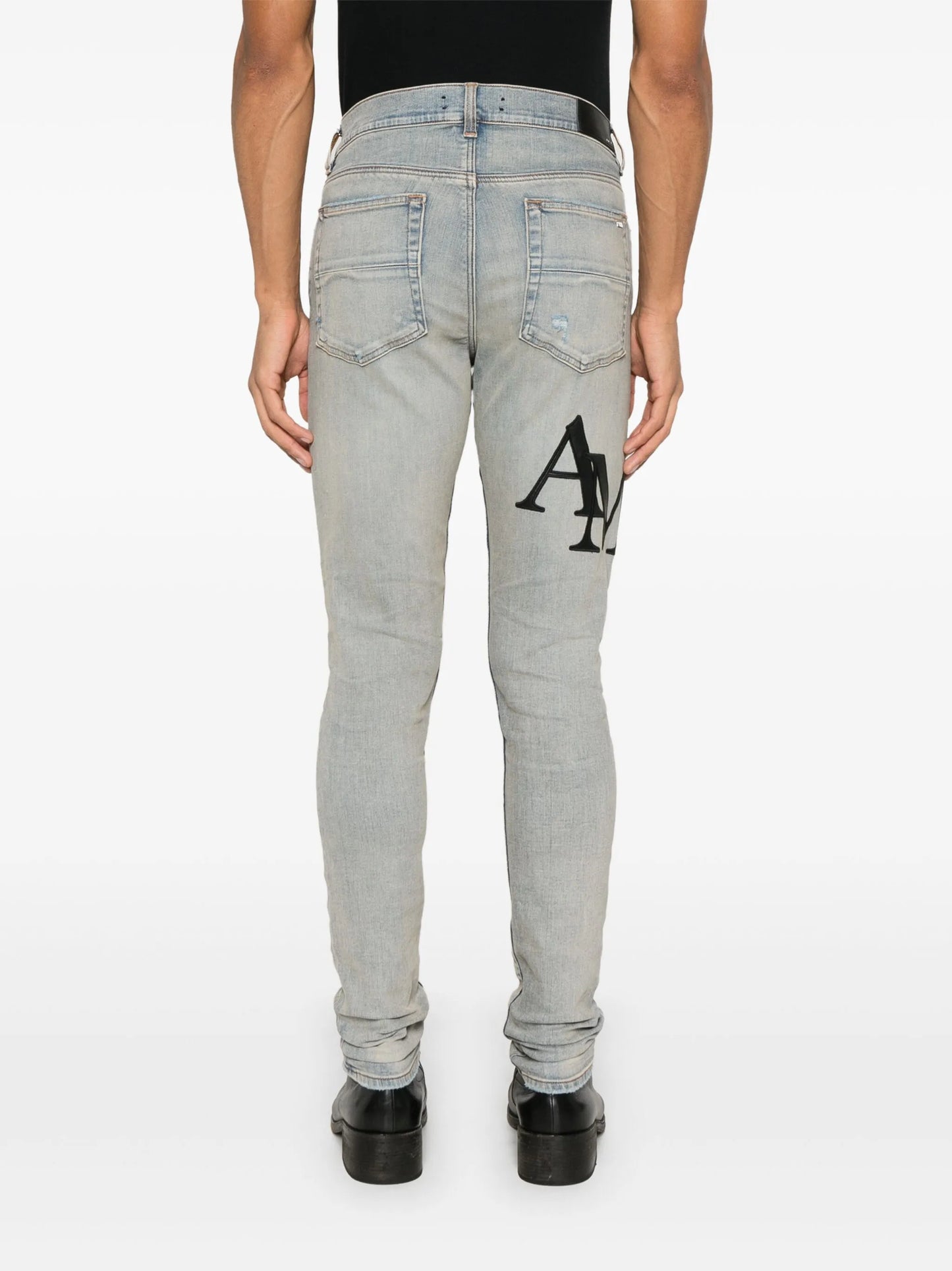 Staggered-logo jeans