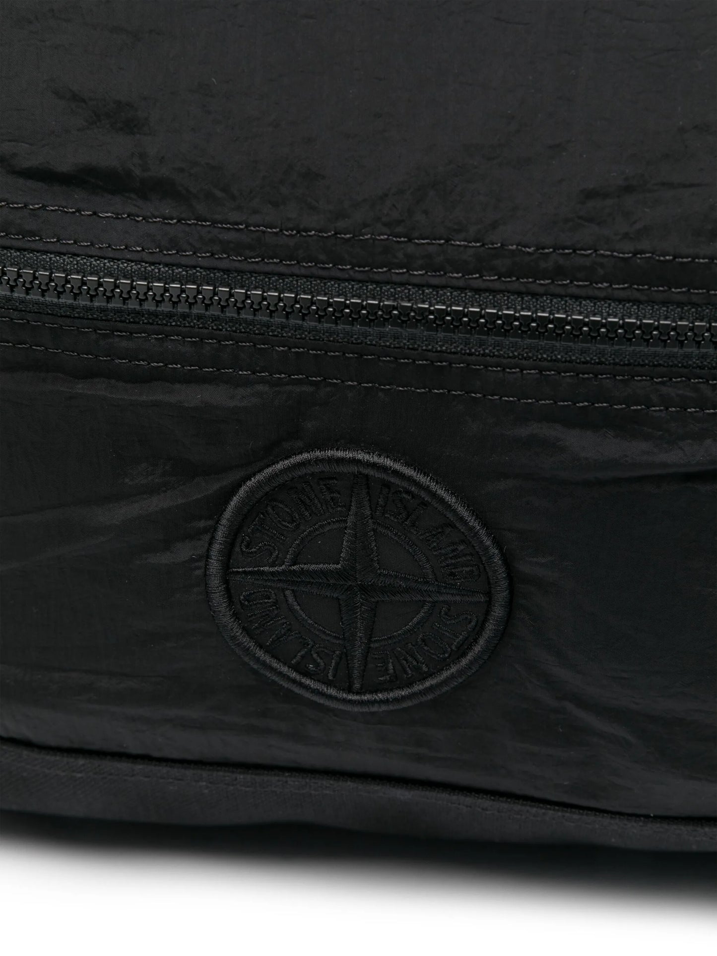 Compass-motif backpack
