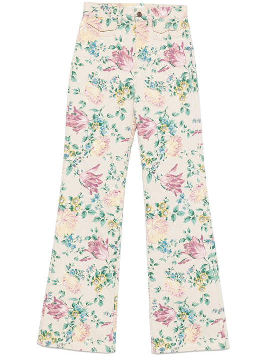 high-waisted floral-print jeans