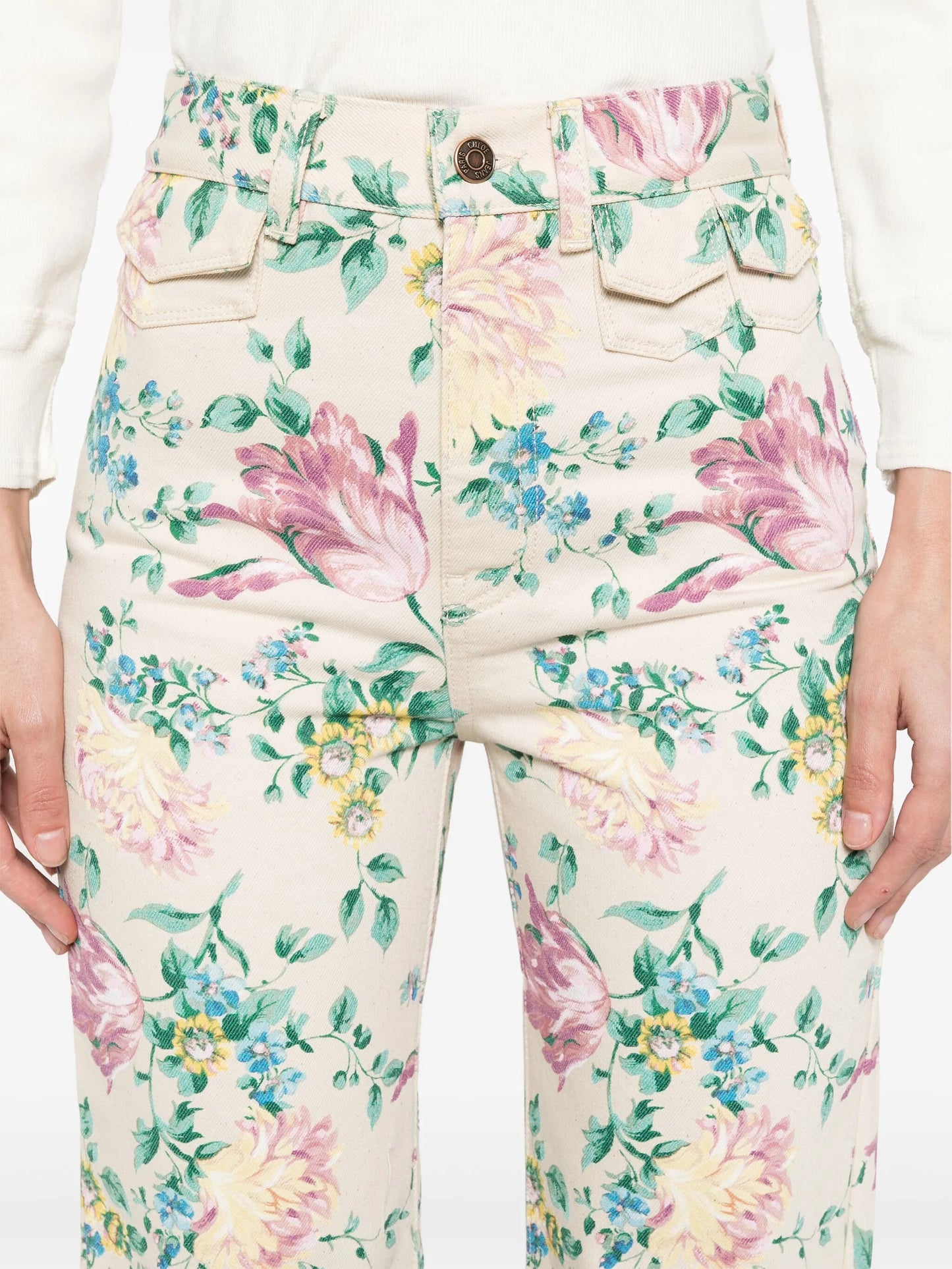 high-waisted floral-print jeans