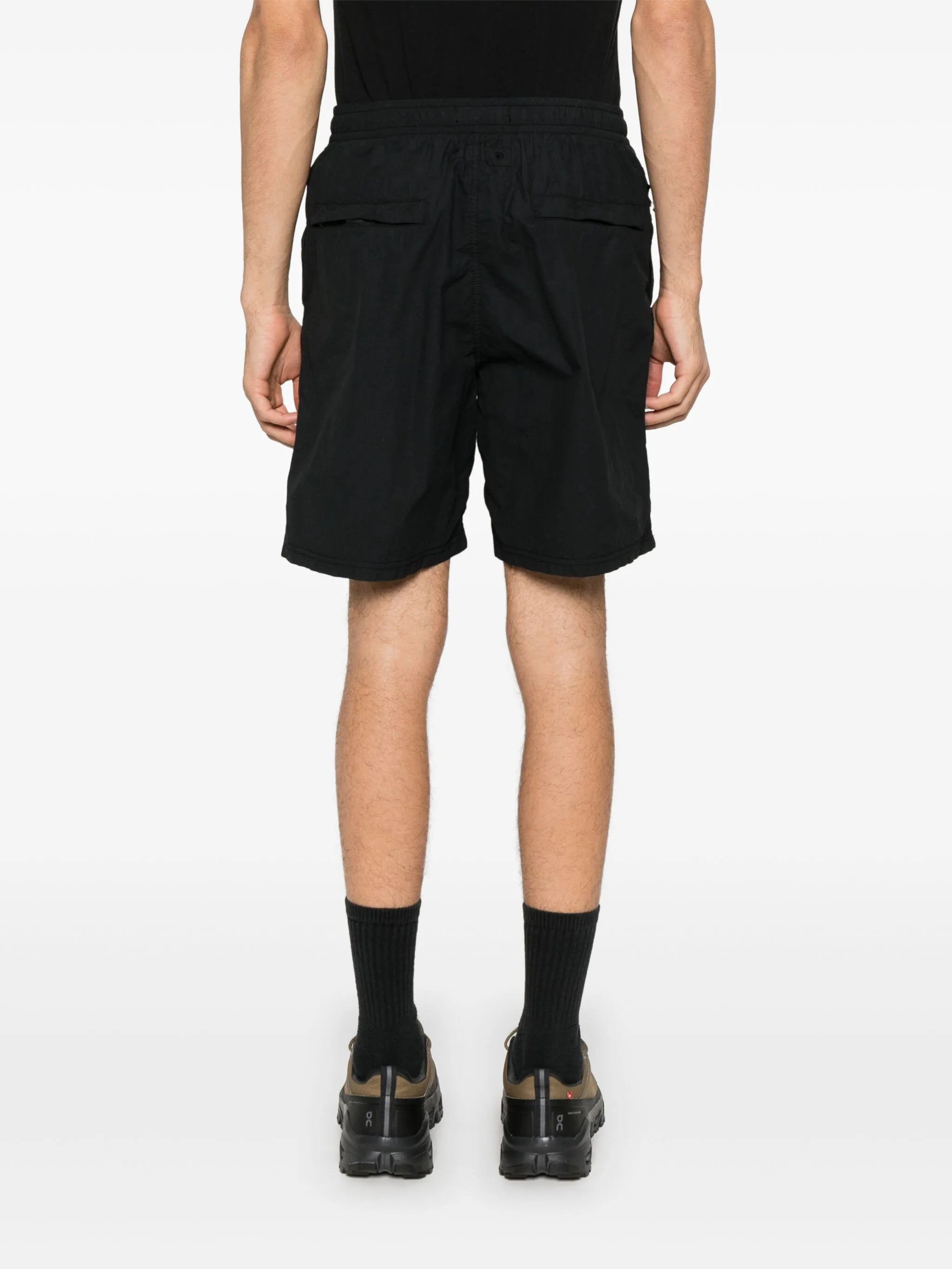 Compass-motif track shorts