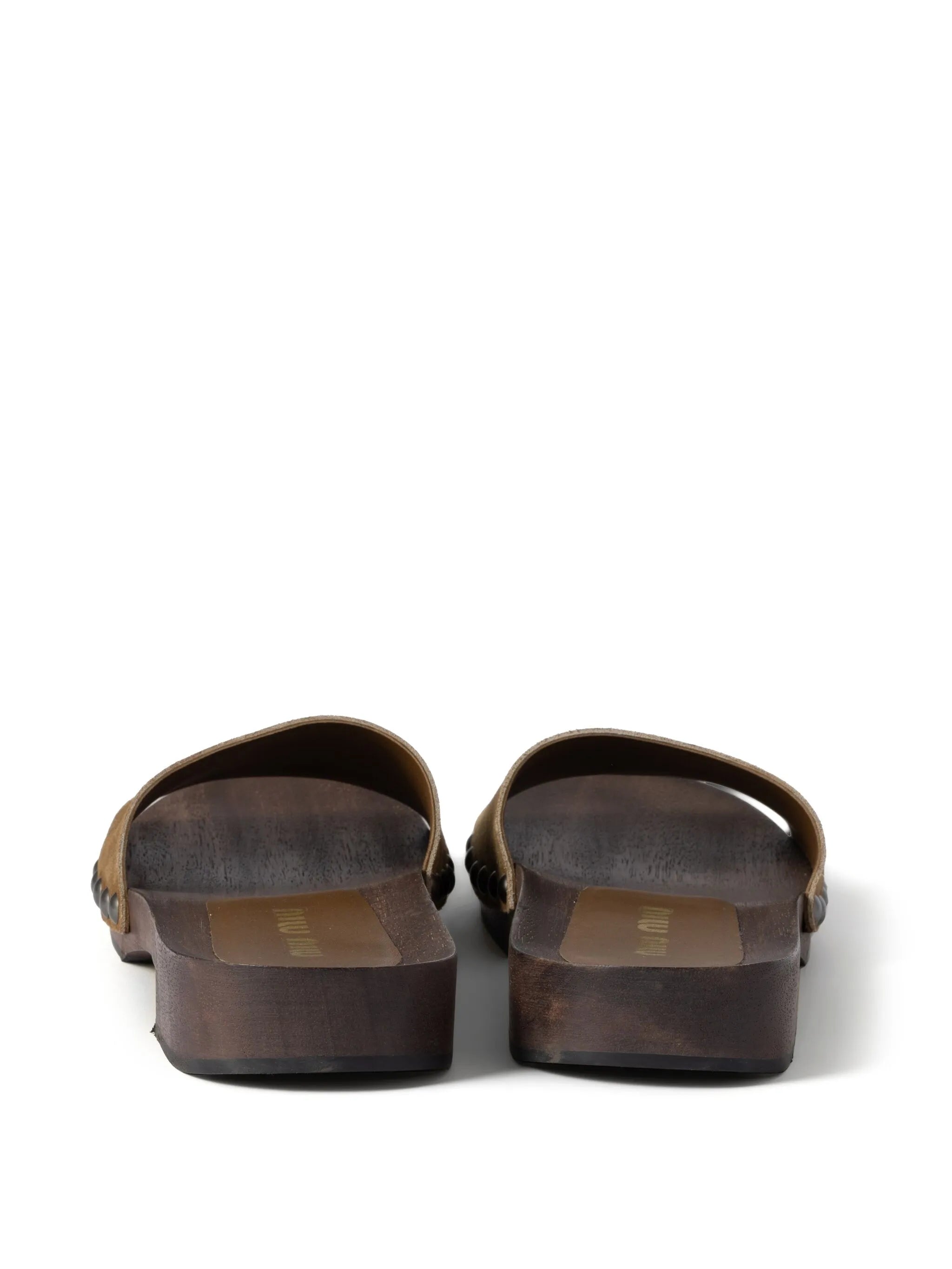 faded-suede clogs