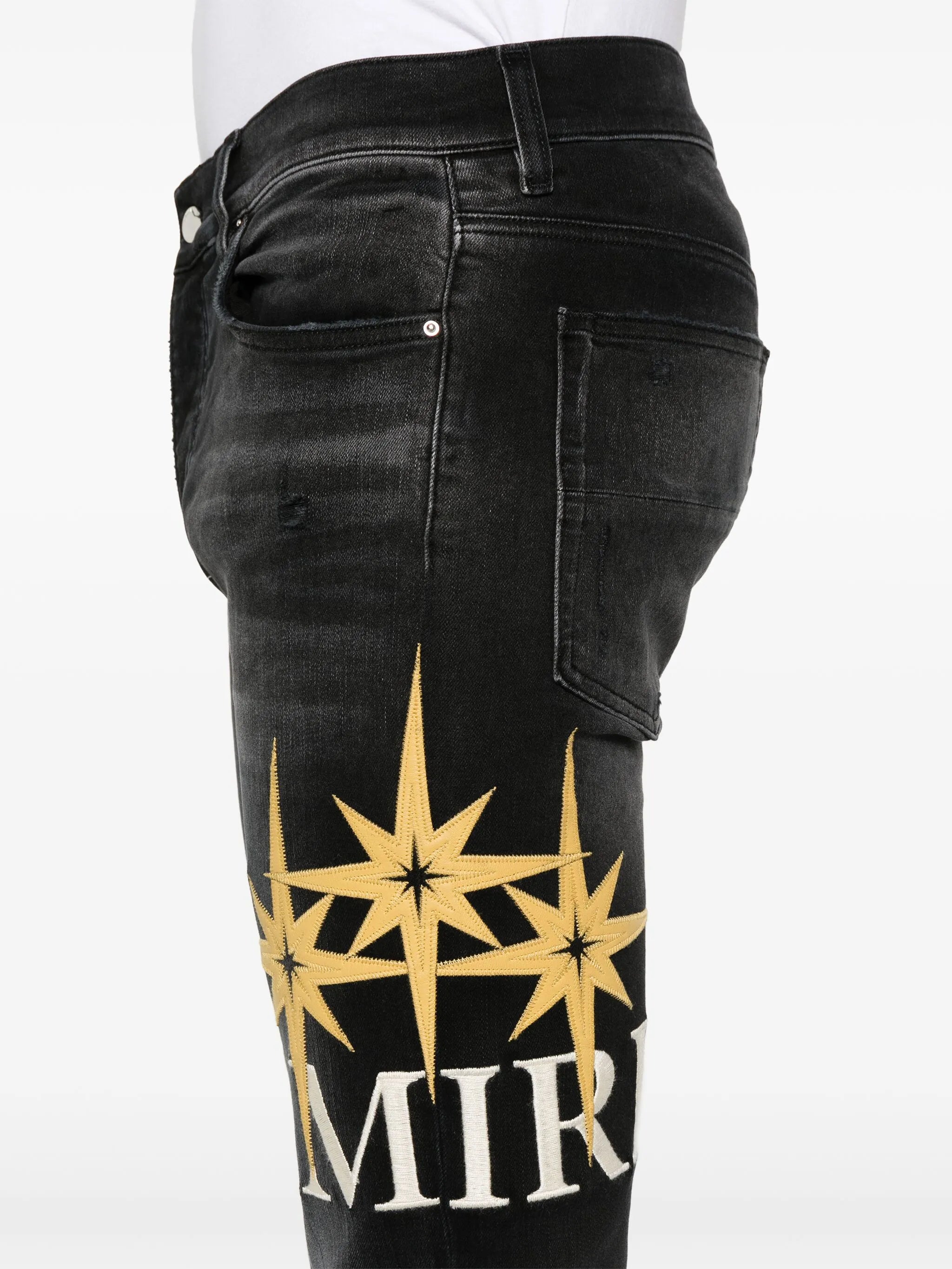 Starburst-appliqué jeans