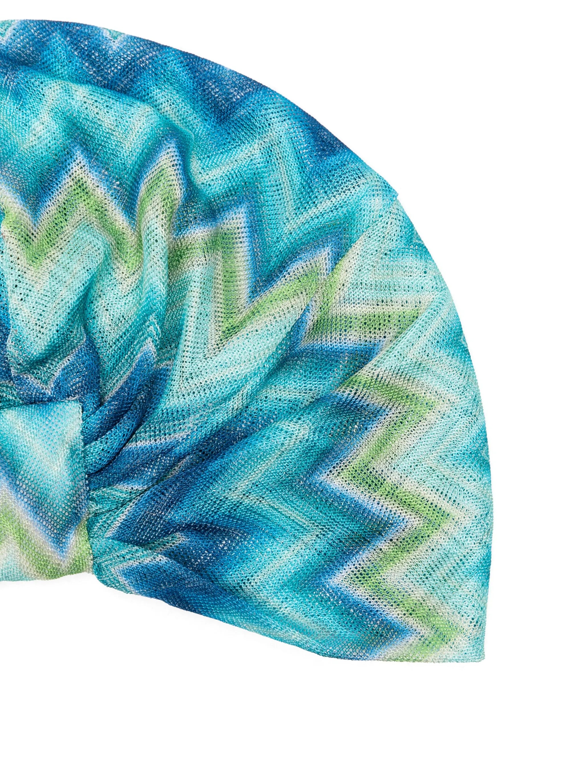 head piece with faded striped pattern