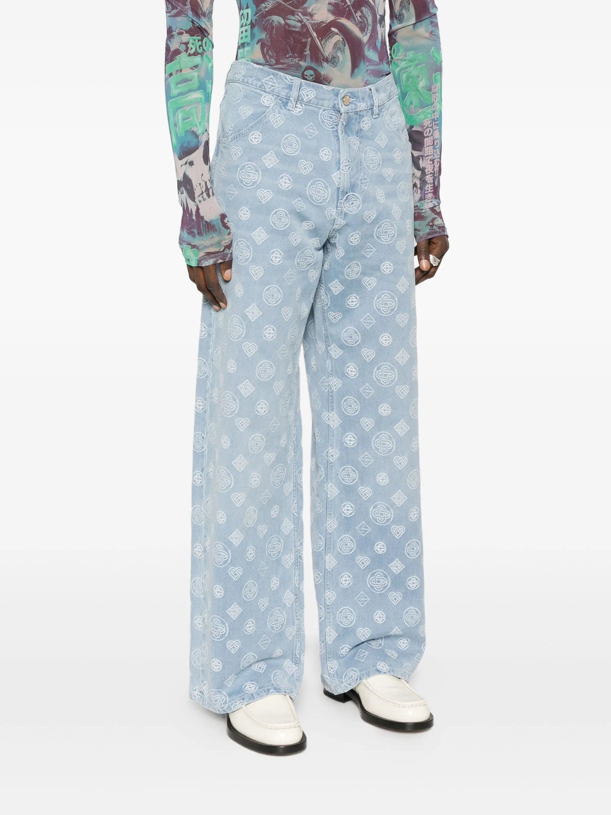 monogram-pattern jeans