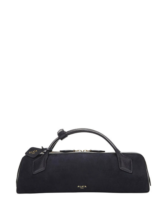 Le Teckel clutch bag