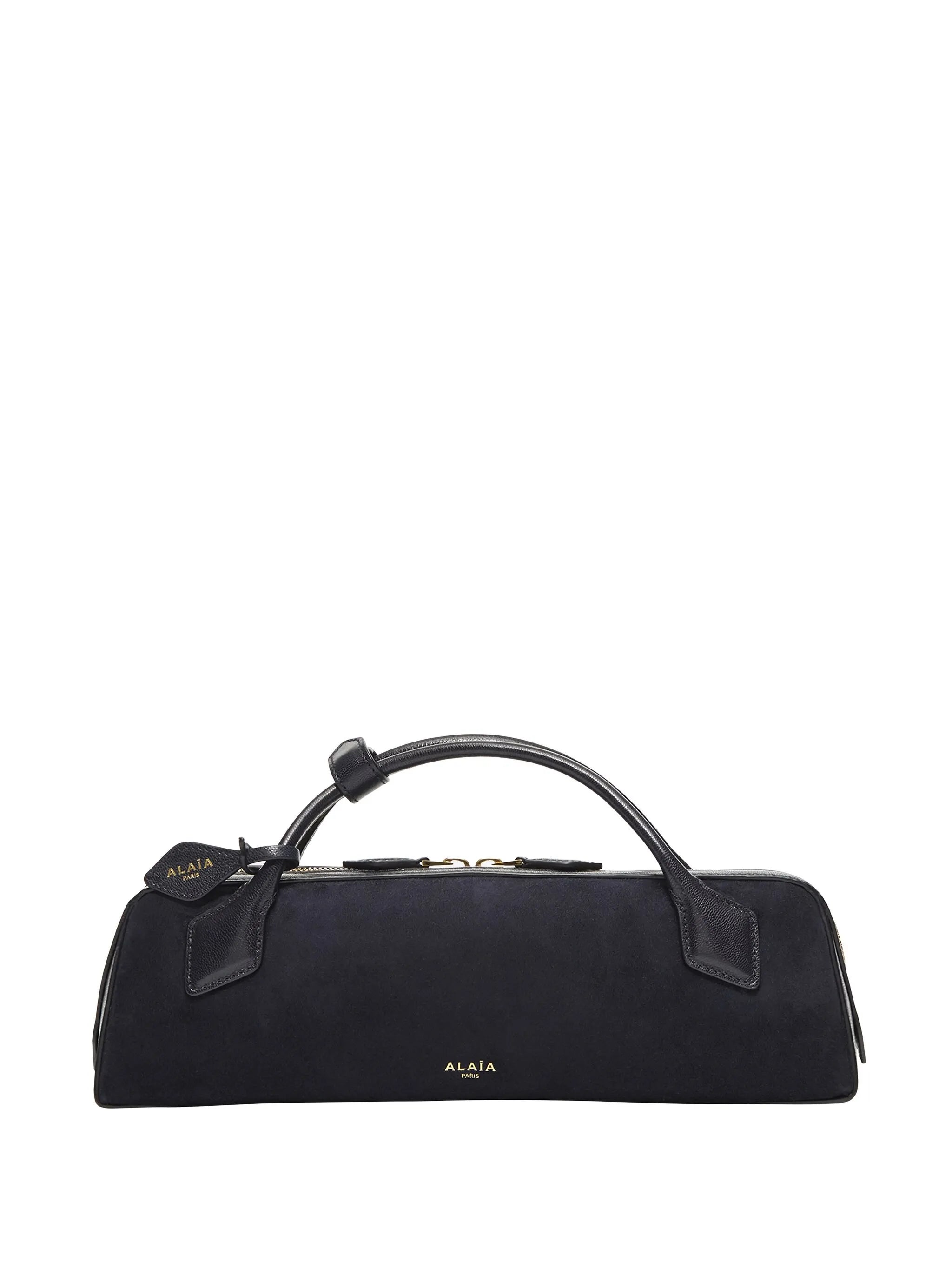 Le Teckel clutch bag