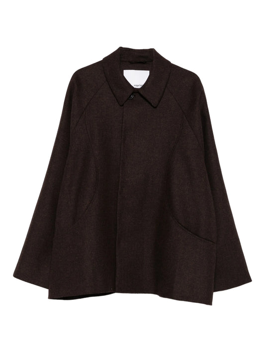 curved-pocket herringbone-pattern overcoat