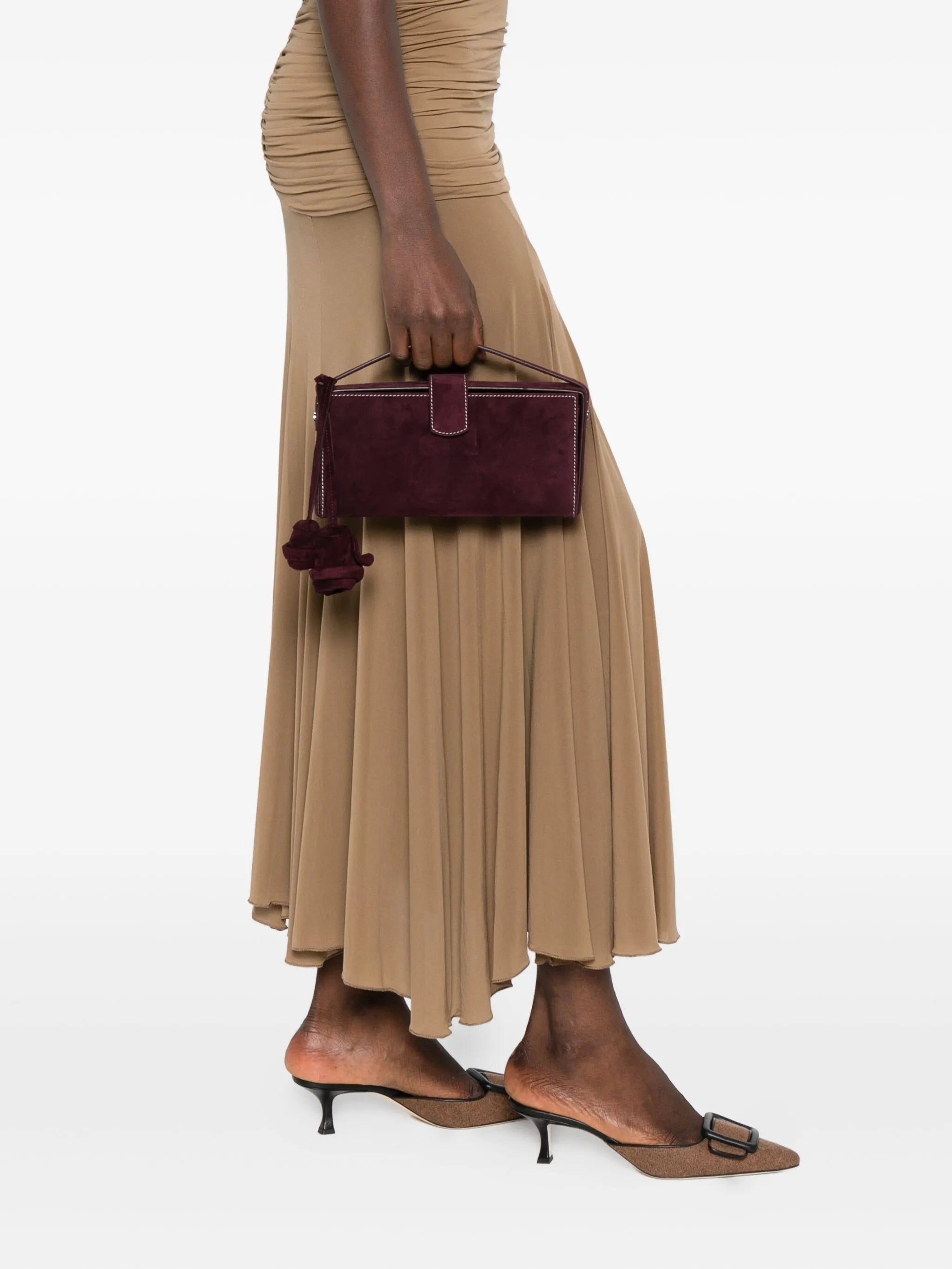 Apolonia rose-embellished suede clutch bag