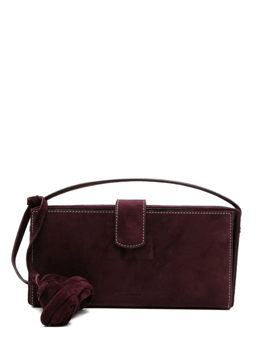 Apolonia rose-embellished suede clutch bag