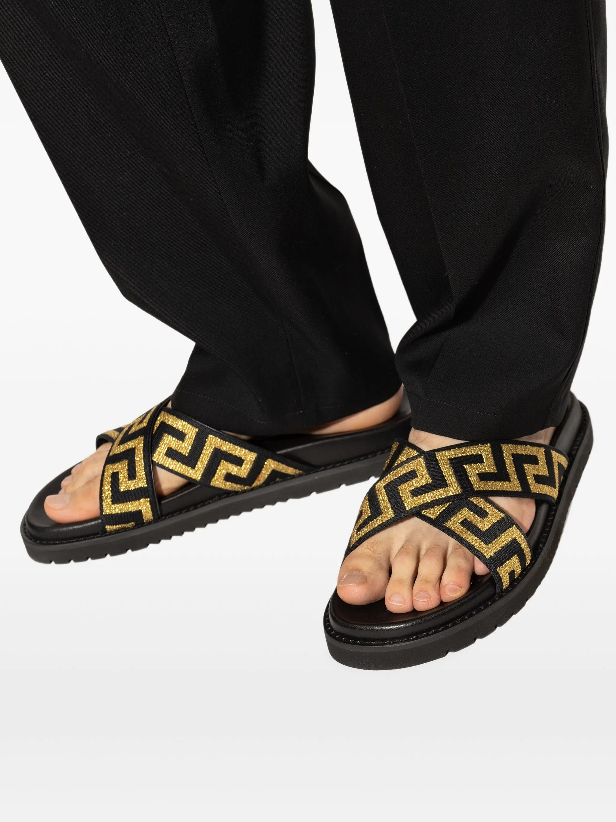 Greca-embellished slides