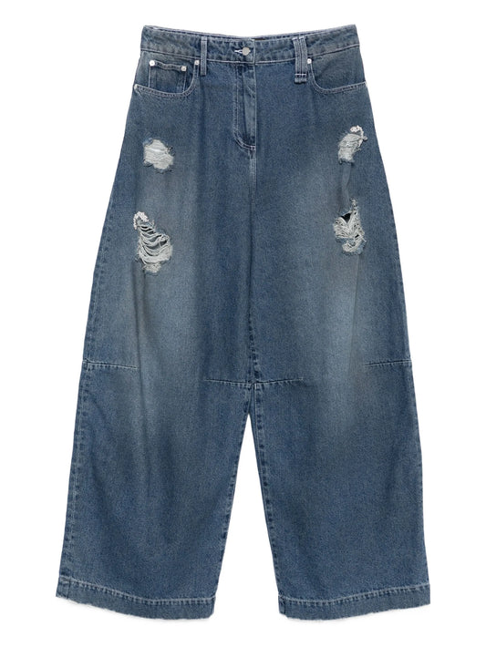 distressed puddle jeans