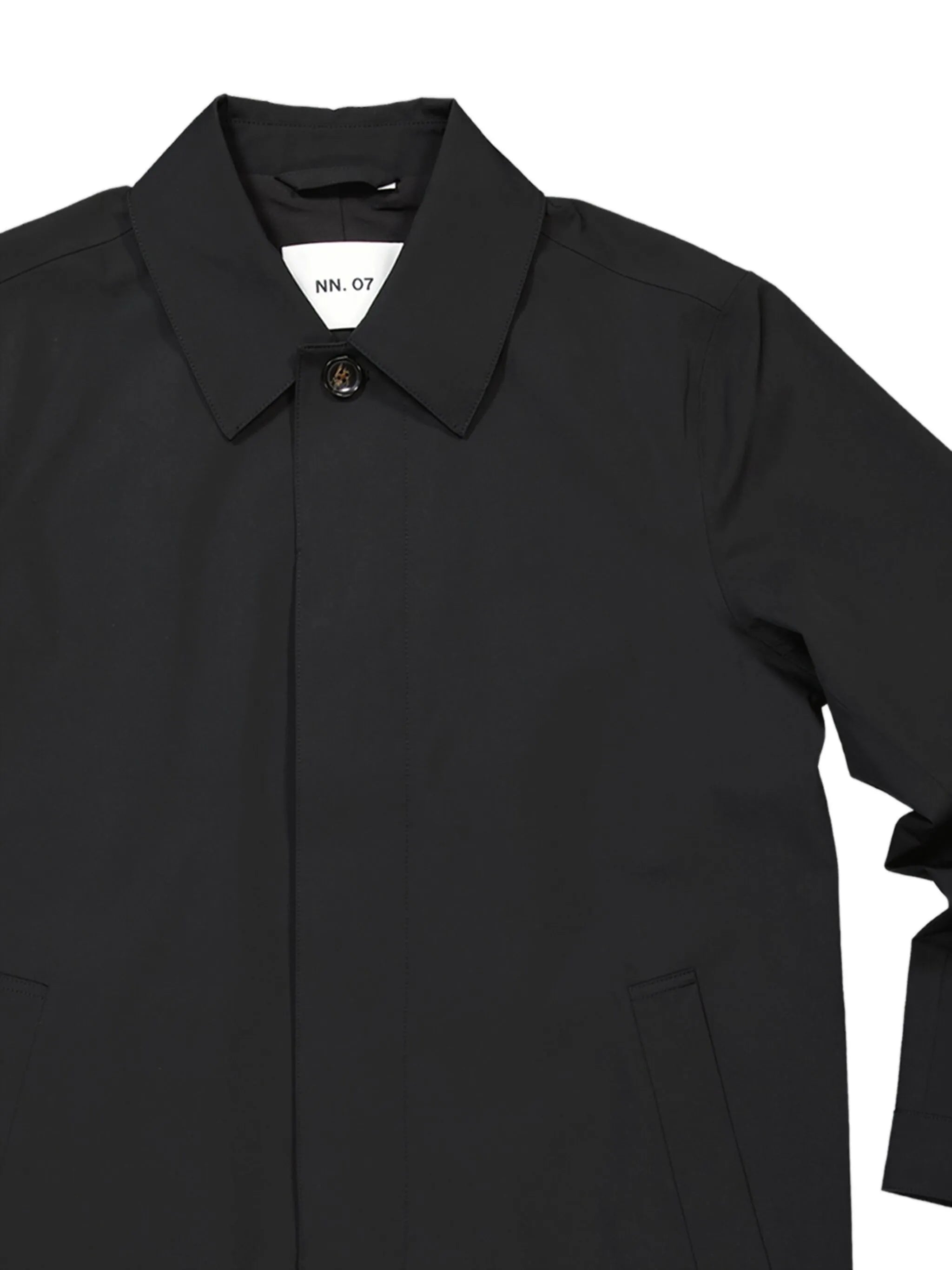 A mid-length, lightweight, transseasonal coat made from breathable, waterproof technical fabric.