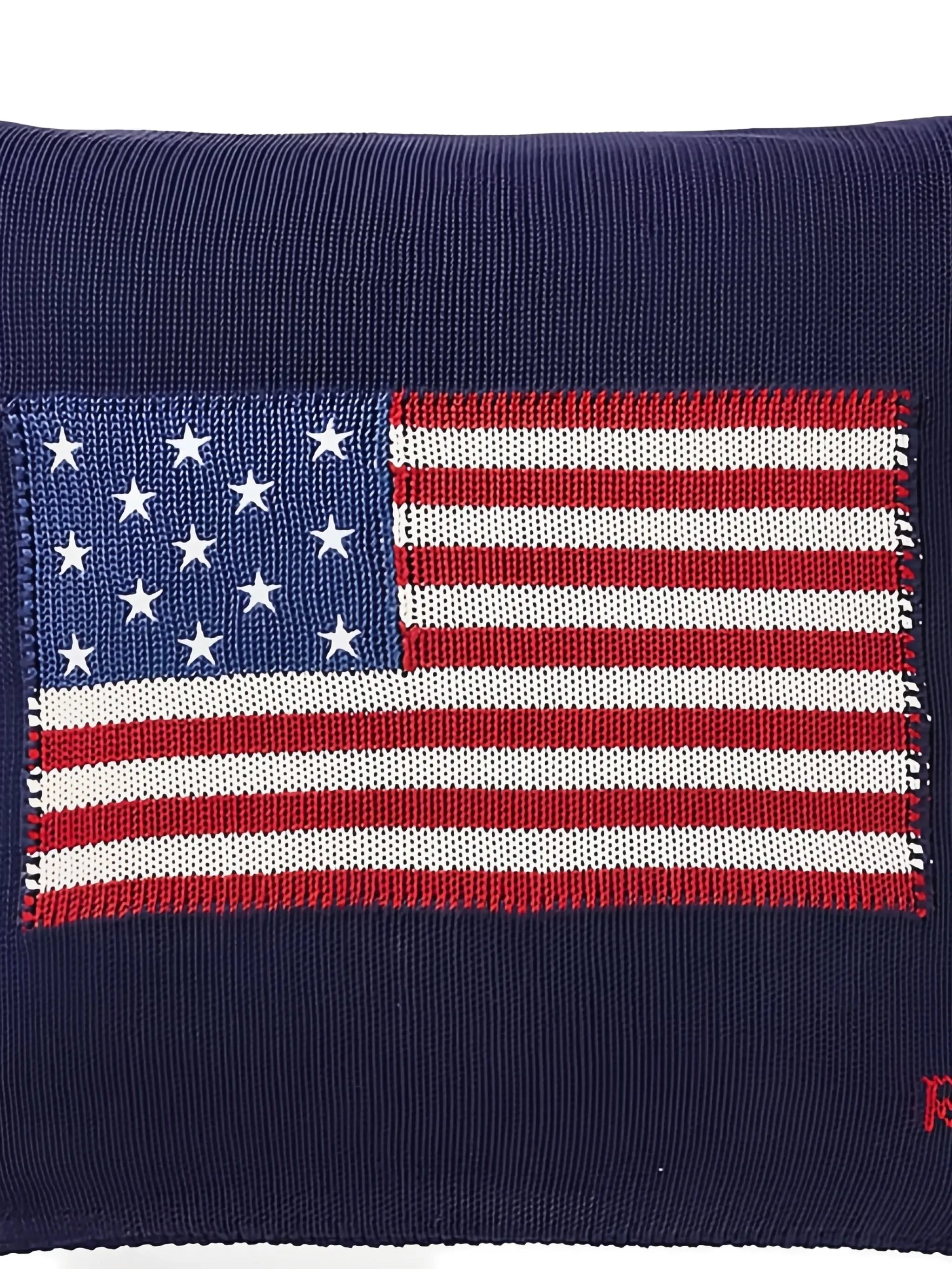 flag-embroidered cushion