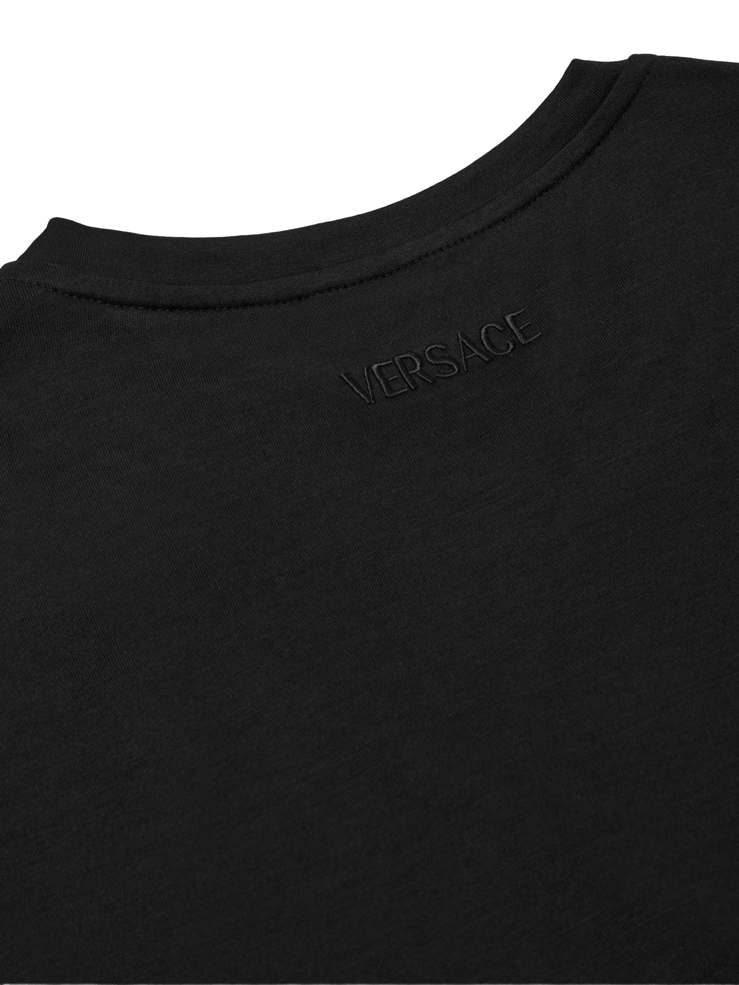 safety-pin draped T-shirt