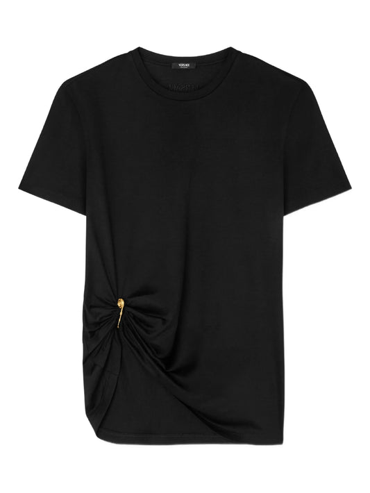 safety-pin draped T-shirt