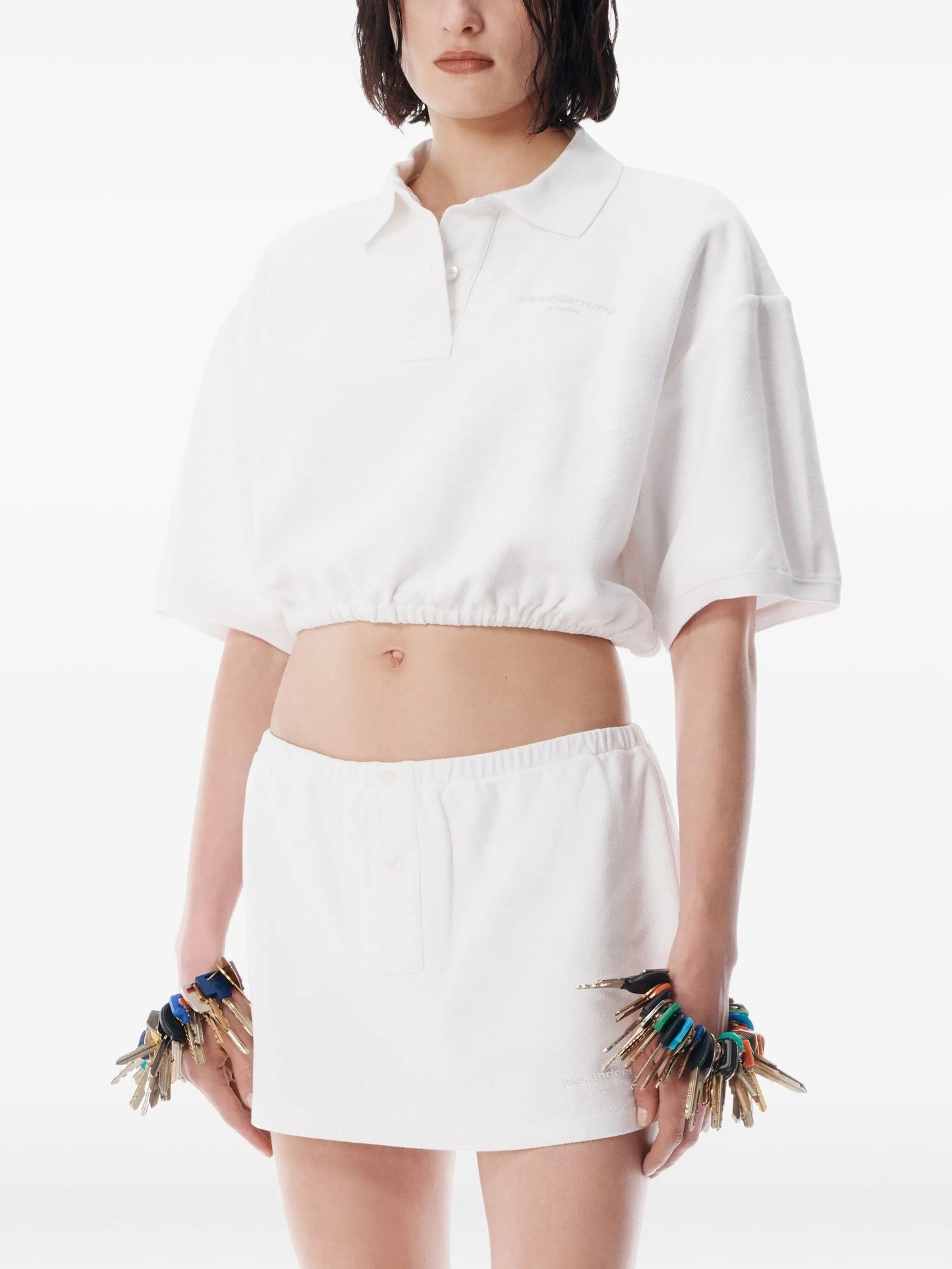 elasticated-waistband buttoned mini skirt