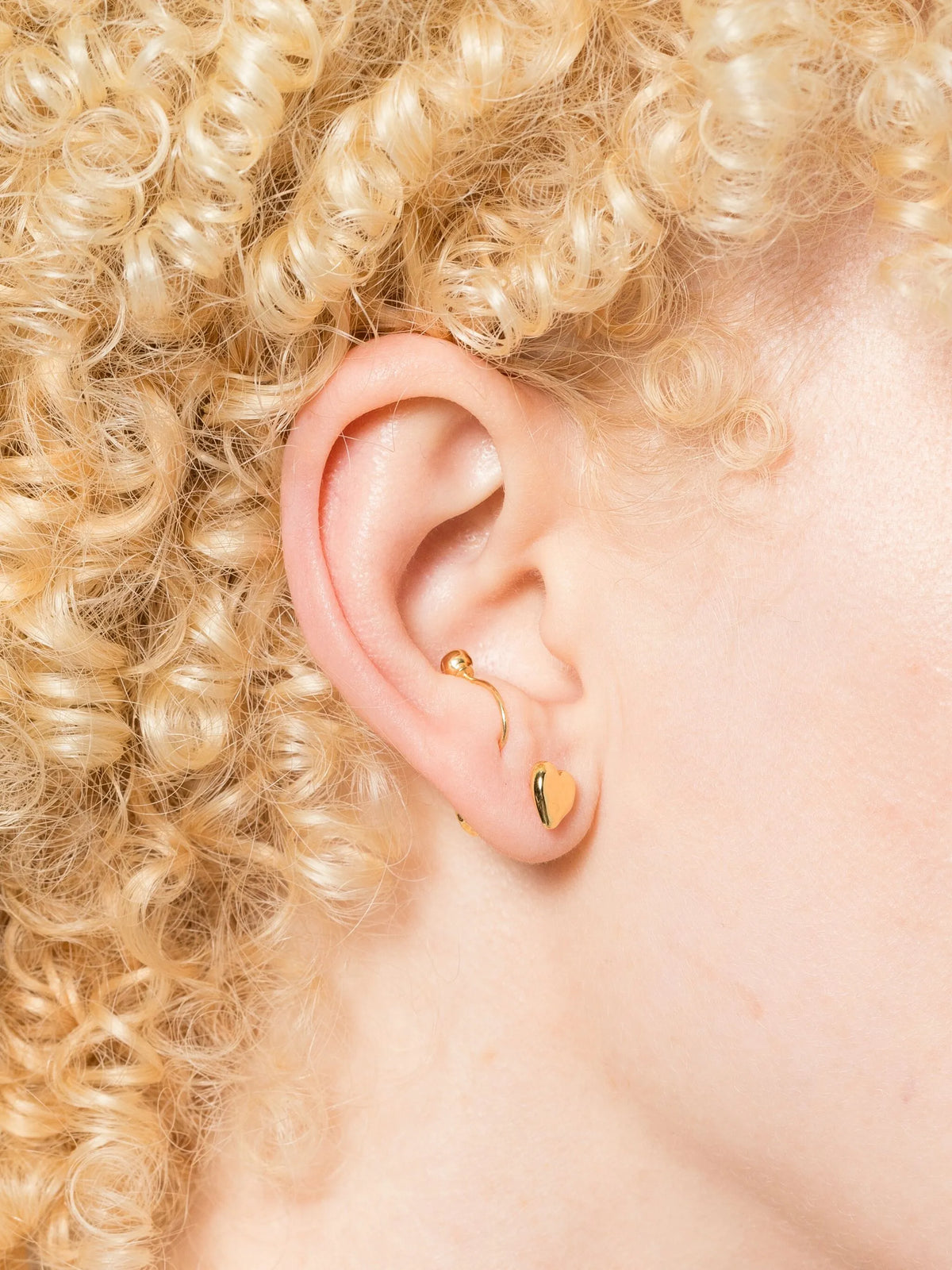 sculpted heart stud earrings