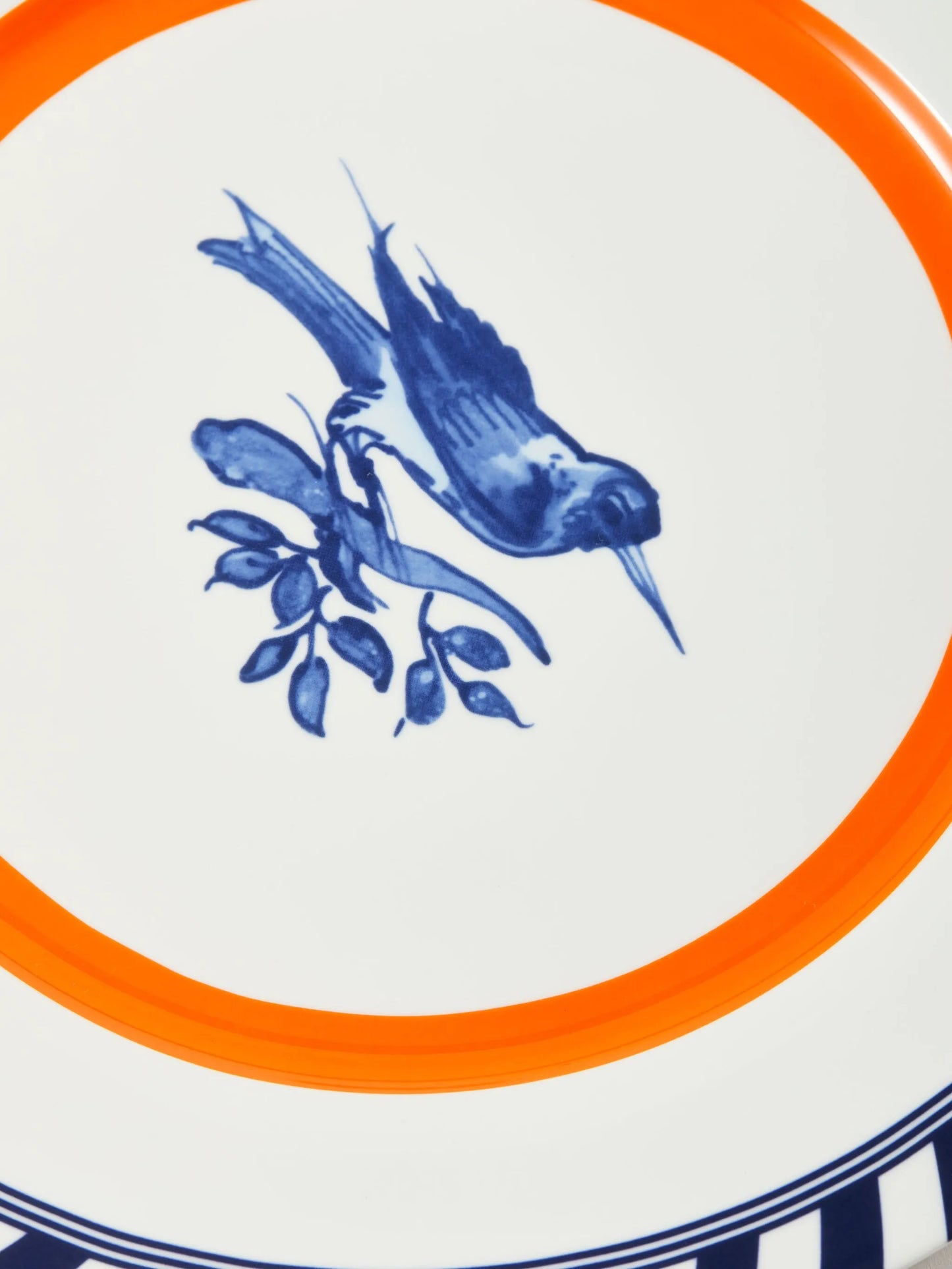 striped bird-motif plates