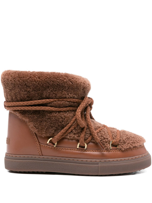 Curly leather ankle boots