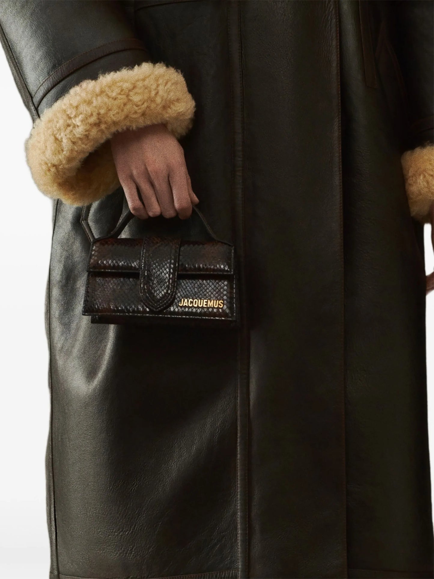 The Bambino top-handle leather clutch bag