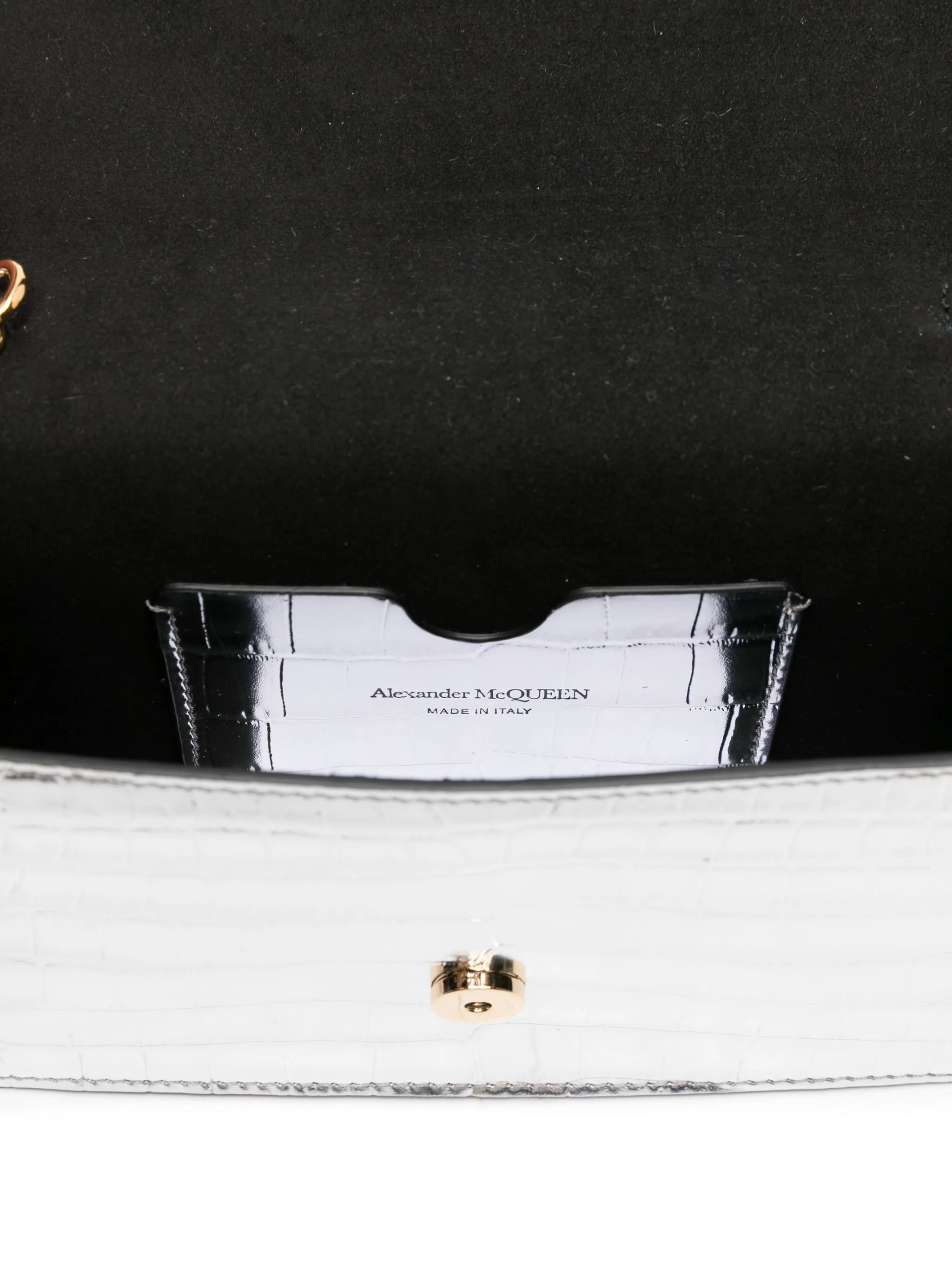skull-embellished crocodile-effect bag